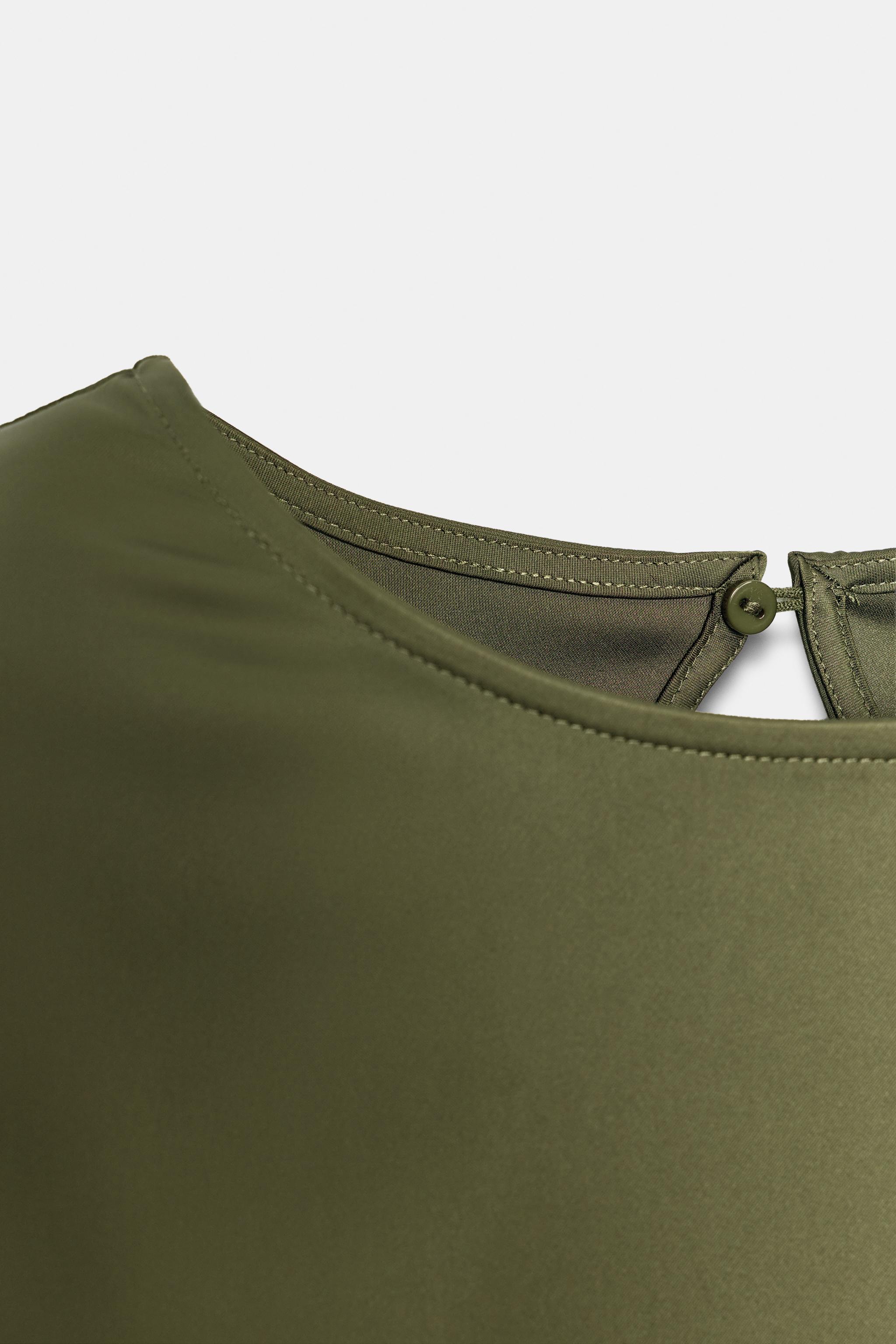 SATIN TOP WITH SHOULDER PADS AND STRAPS