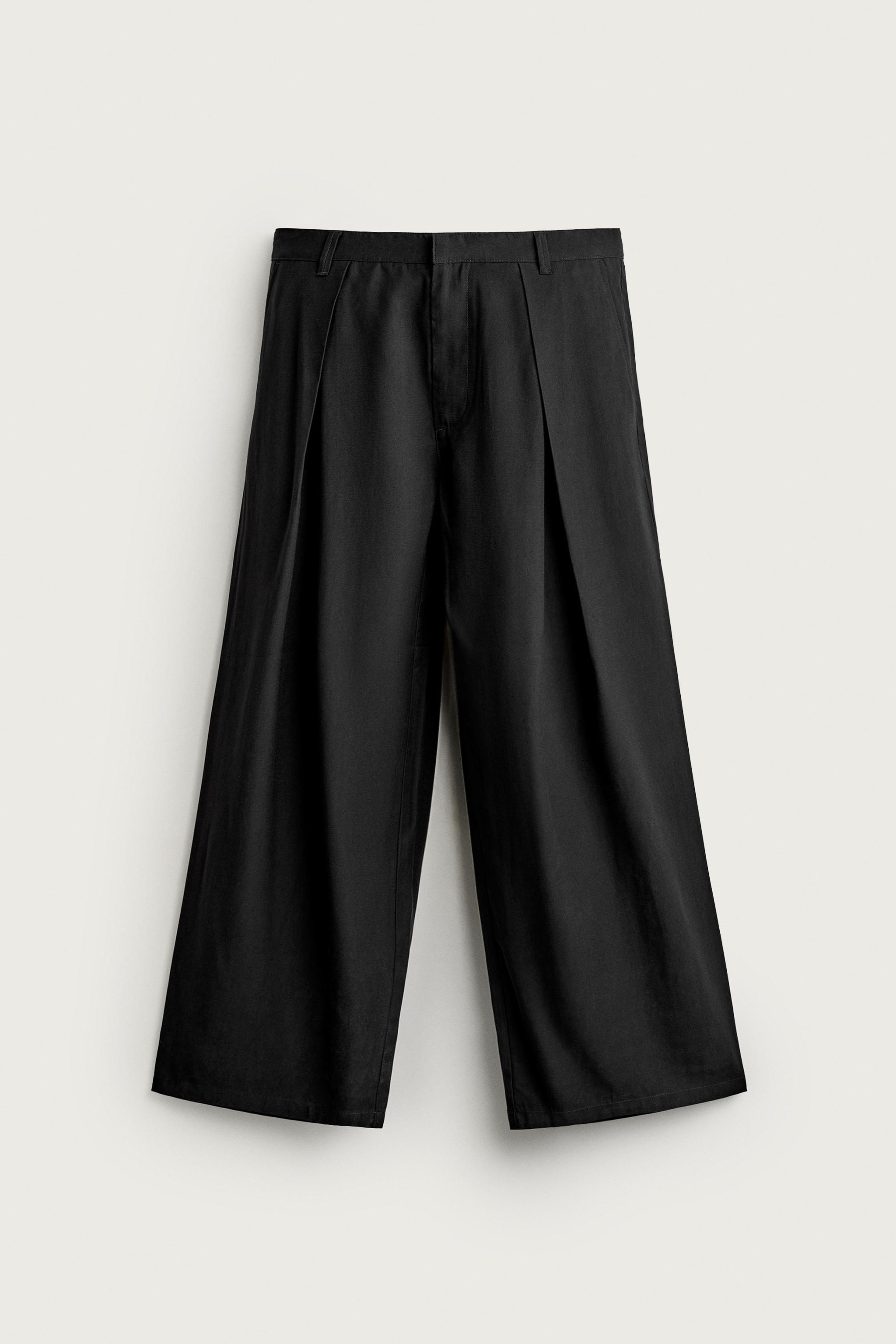 PLEATED FLUID TROUSERS — Black