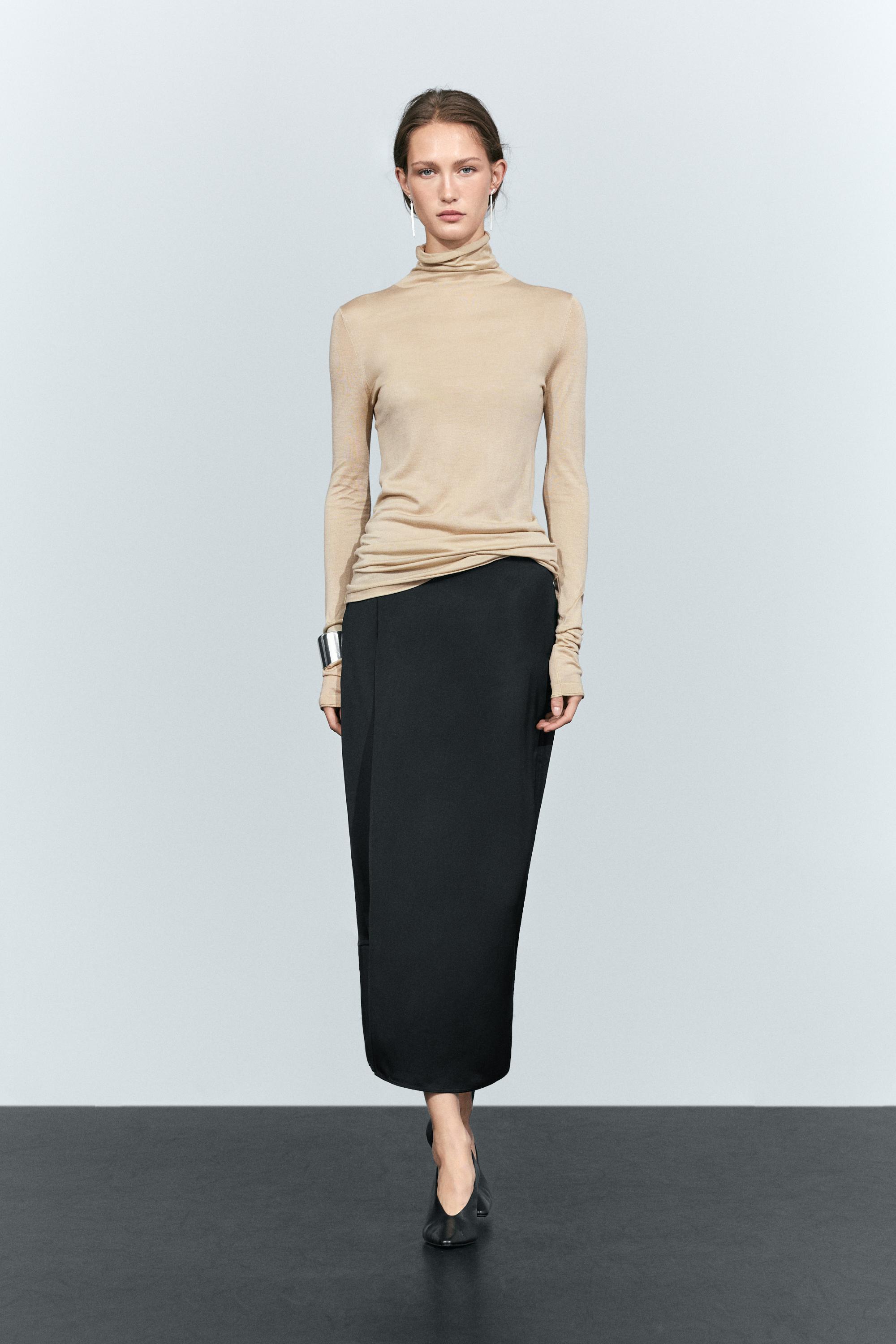 Jupe midi droite double coupe semi-transparente