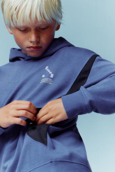 سويت شيرت SPORTY COLOR BLOCK - خبازي فاتح الخاص بـ Zara