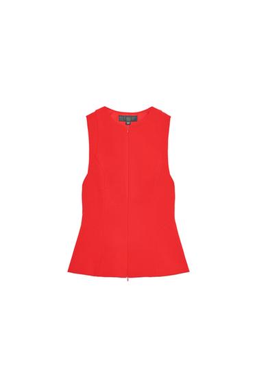 Front view of a fitted red top without sleeves, round neck, and concealed front zip.