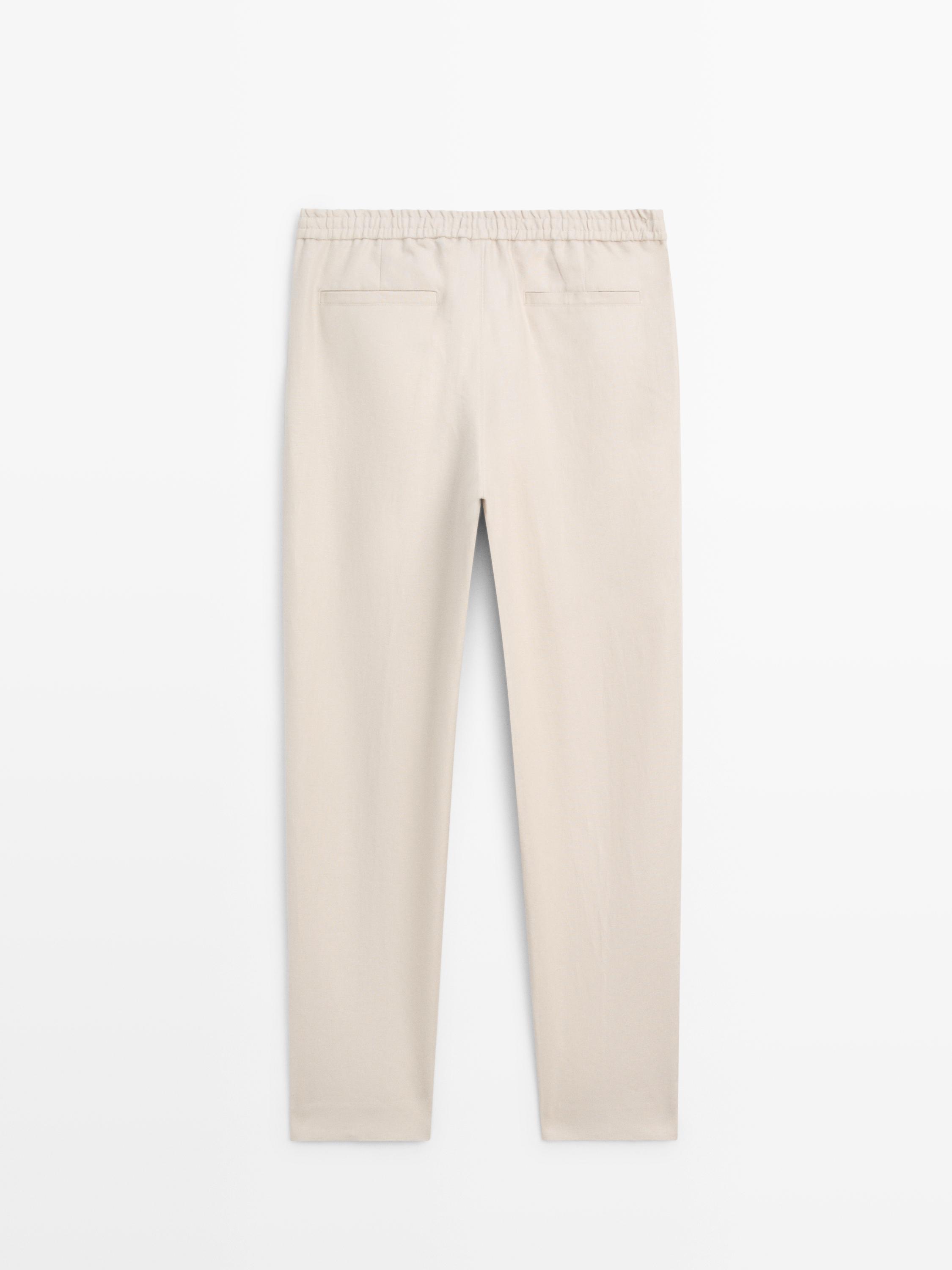 Total look linen trousers with waist detail