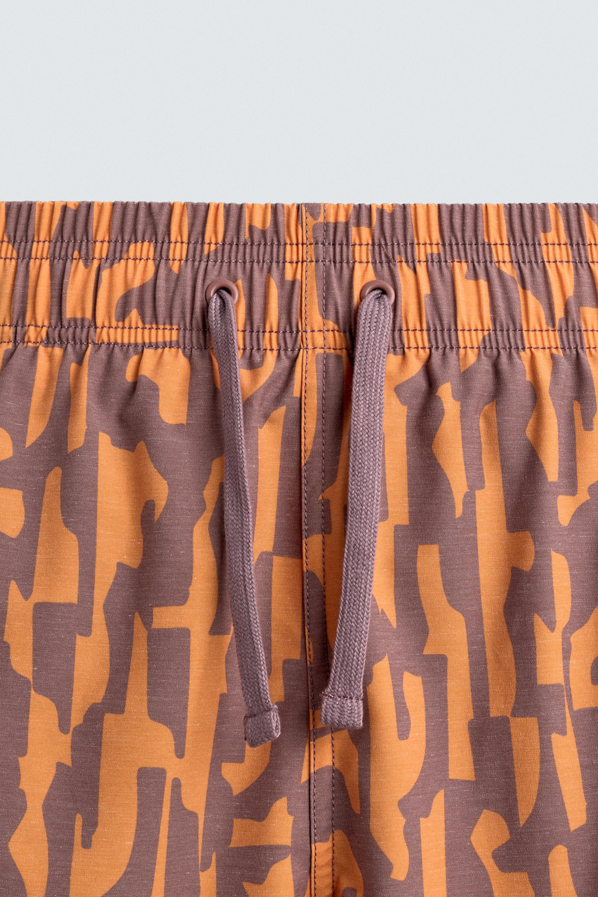 MAILLOT DE BAIN LONG À IMPRIMÉ ABSTRAIT