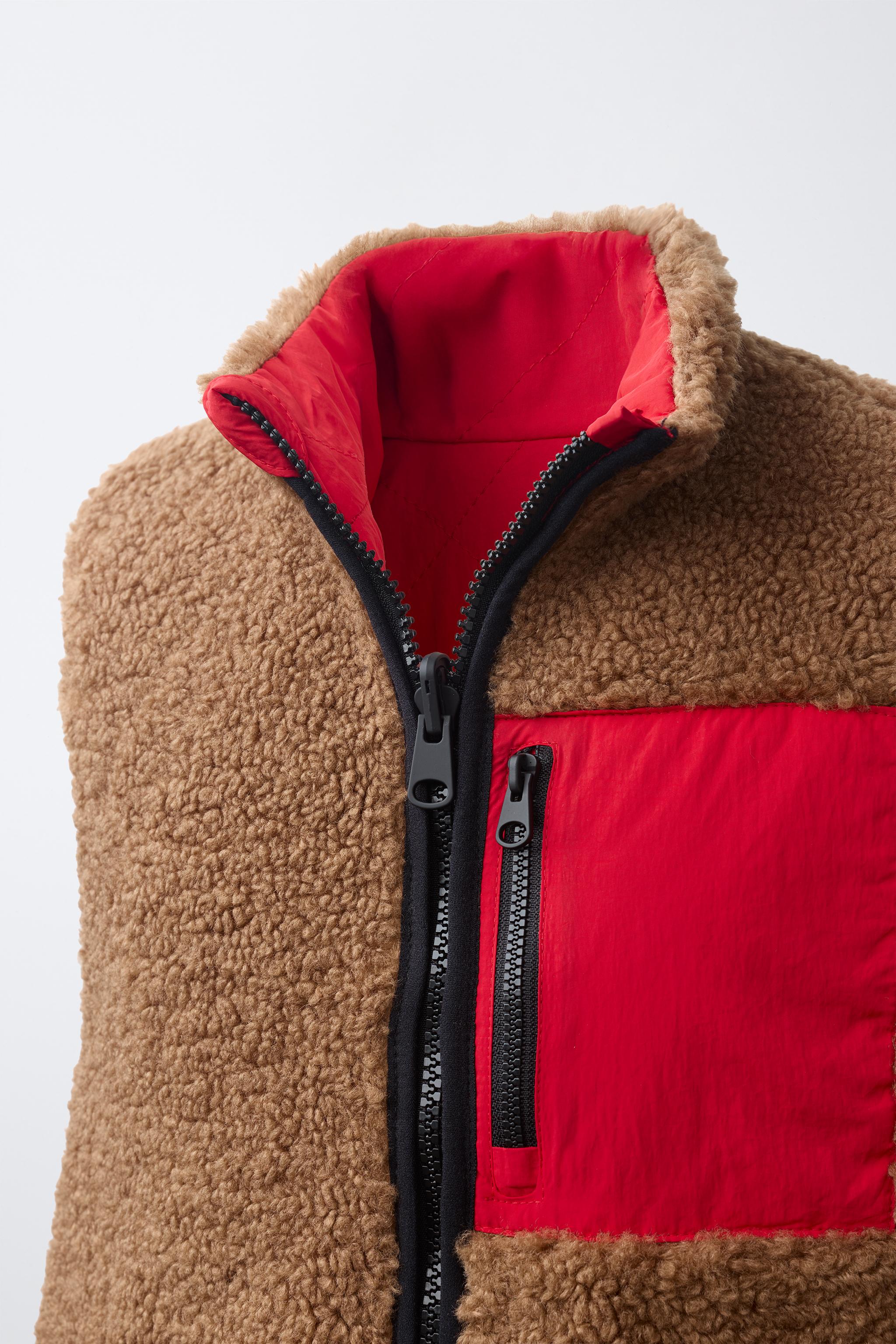 GILET SANS MANCHES RÉVERSIBLE EFFET MOUTON