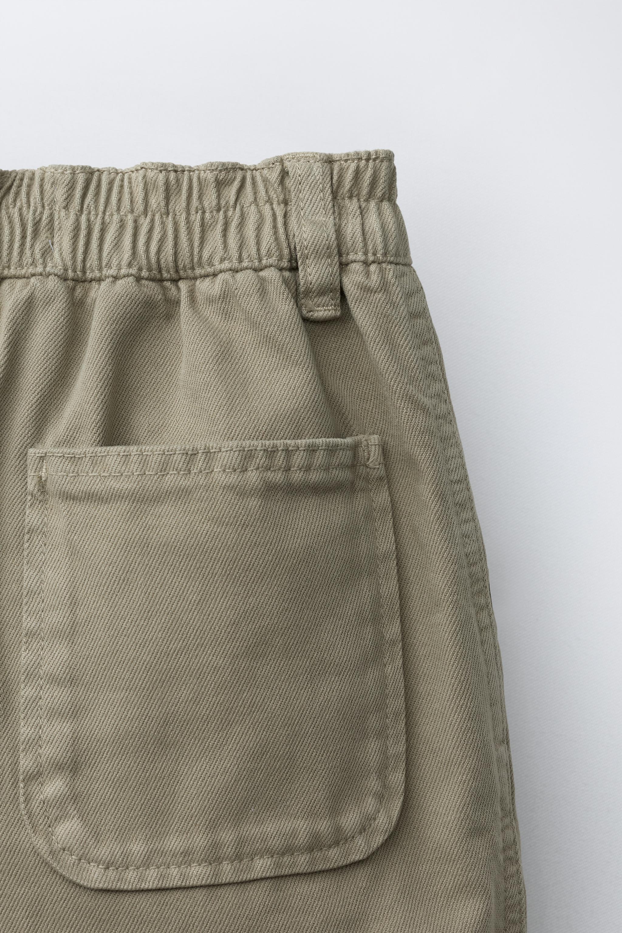 PLEATED SHORTS