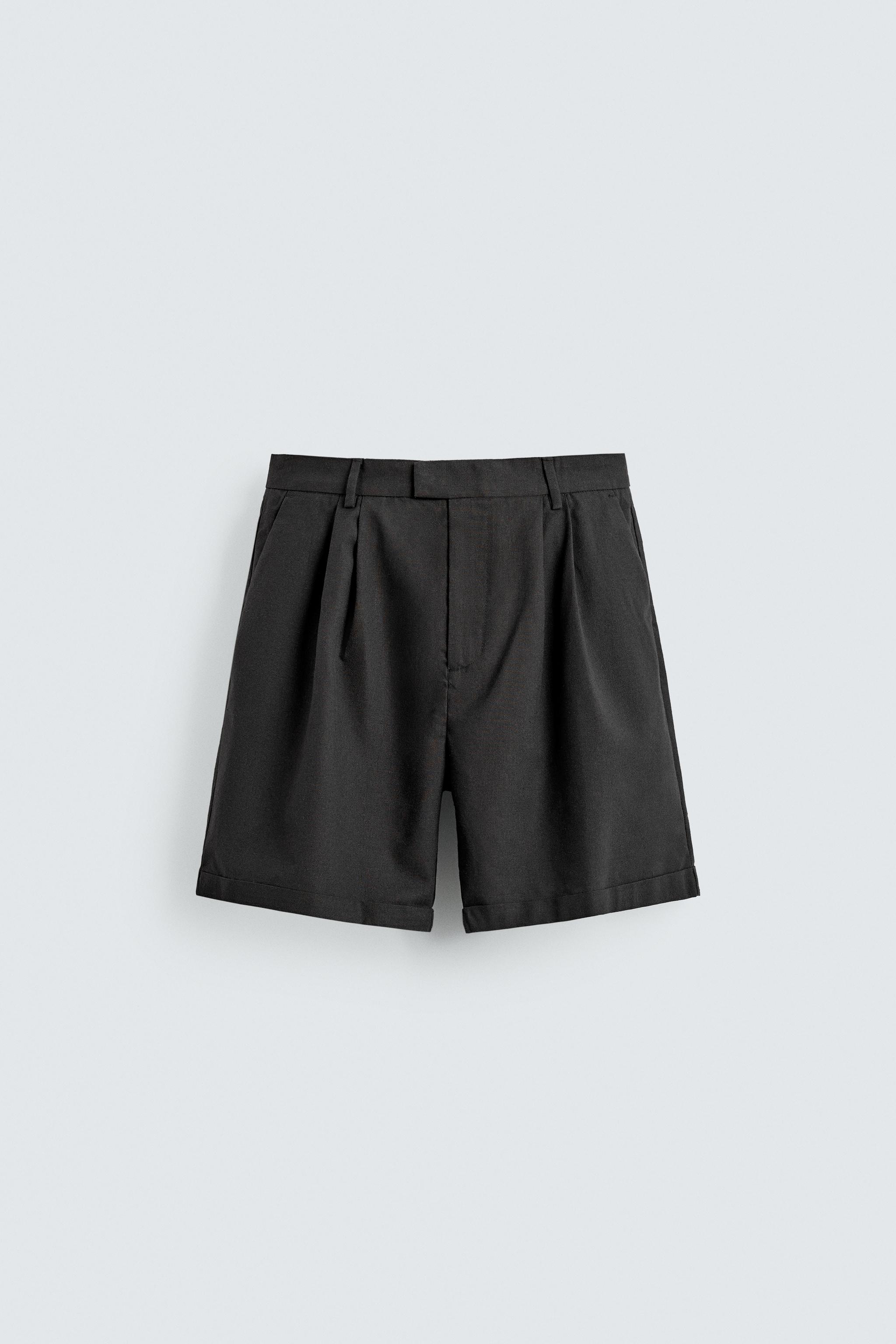 RELAXED FIT PLEATED SHORTS