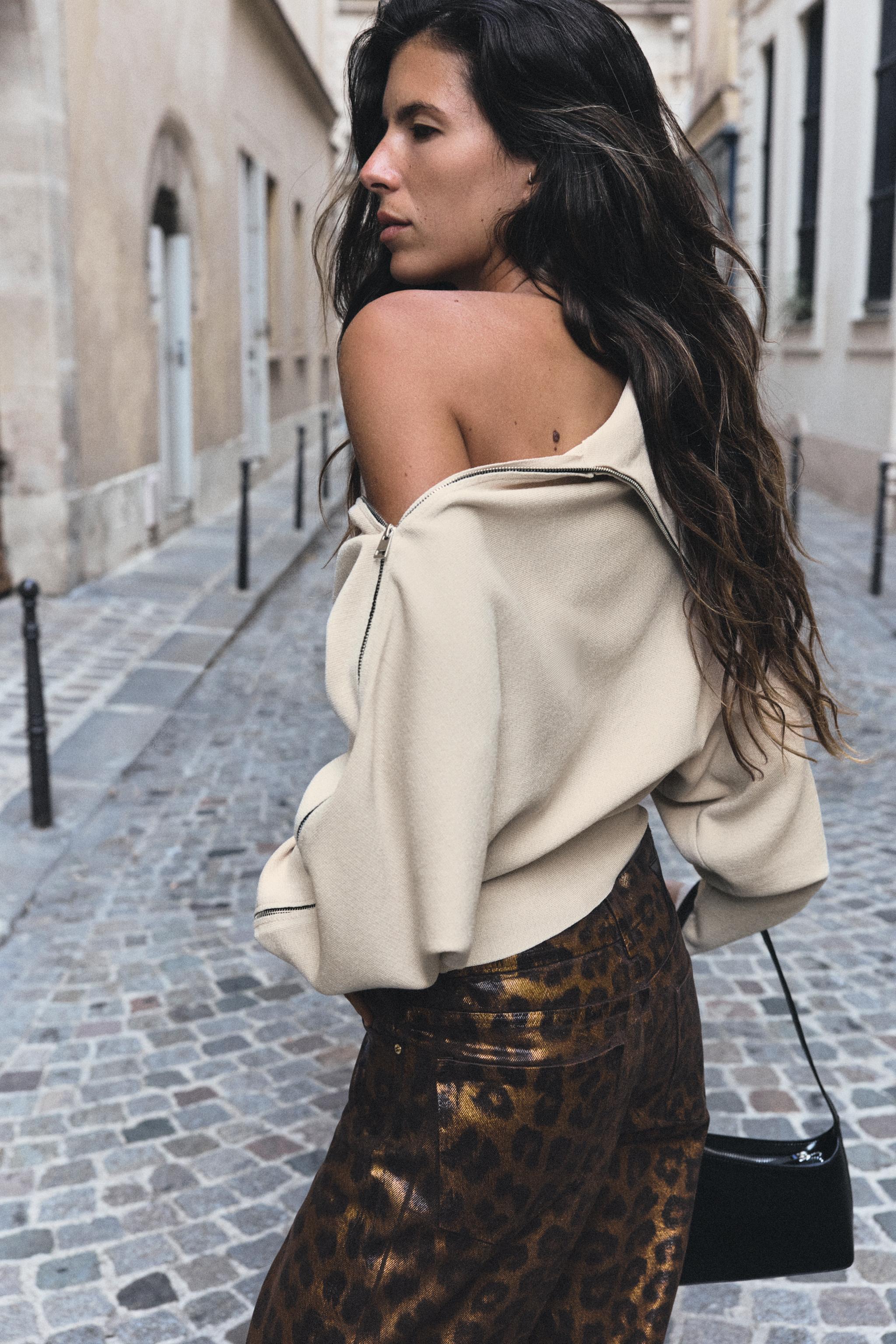 PULL EN MAILLE À ZIP LATÉRAL