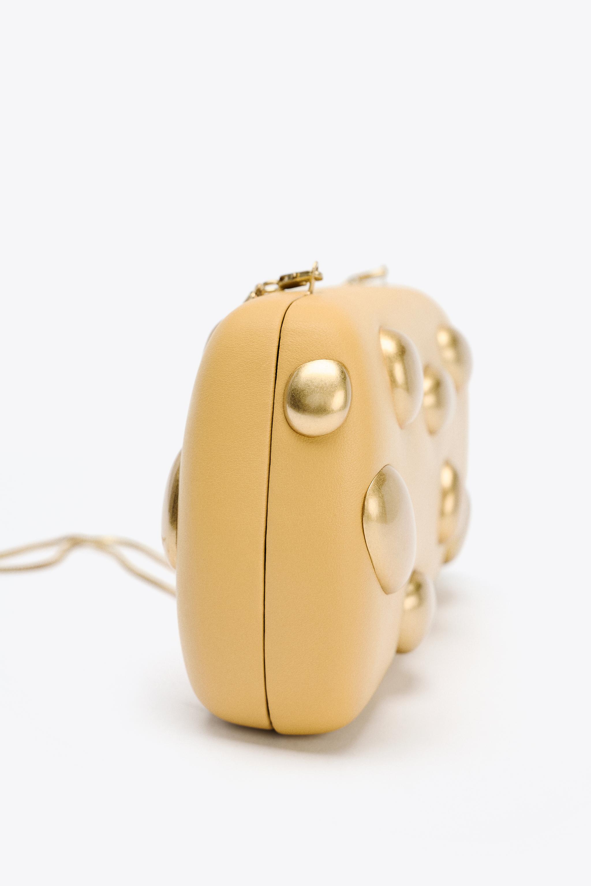 ZARA【NEW】CLUTCH WITH L APPLIQUES CLUTCH WITH METAL APPLIQUÉS - Mustard | ZARA United Kingdom