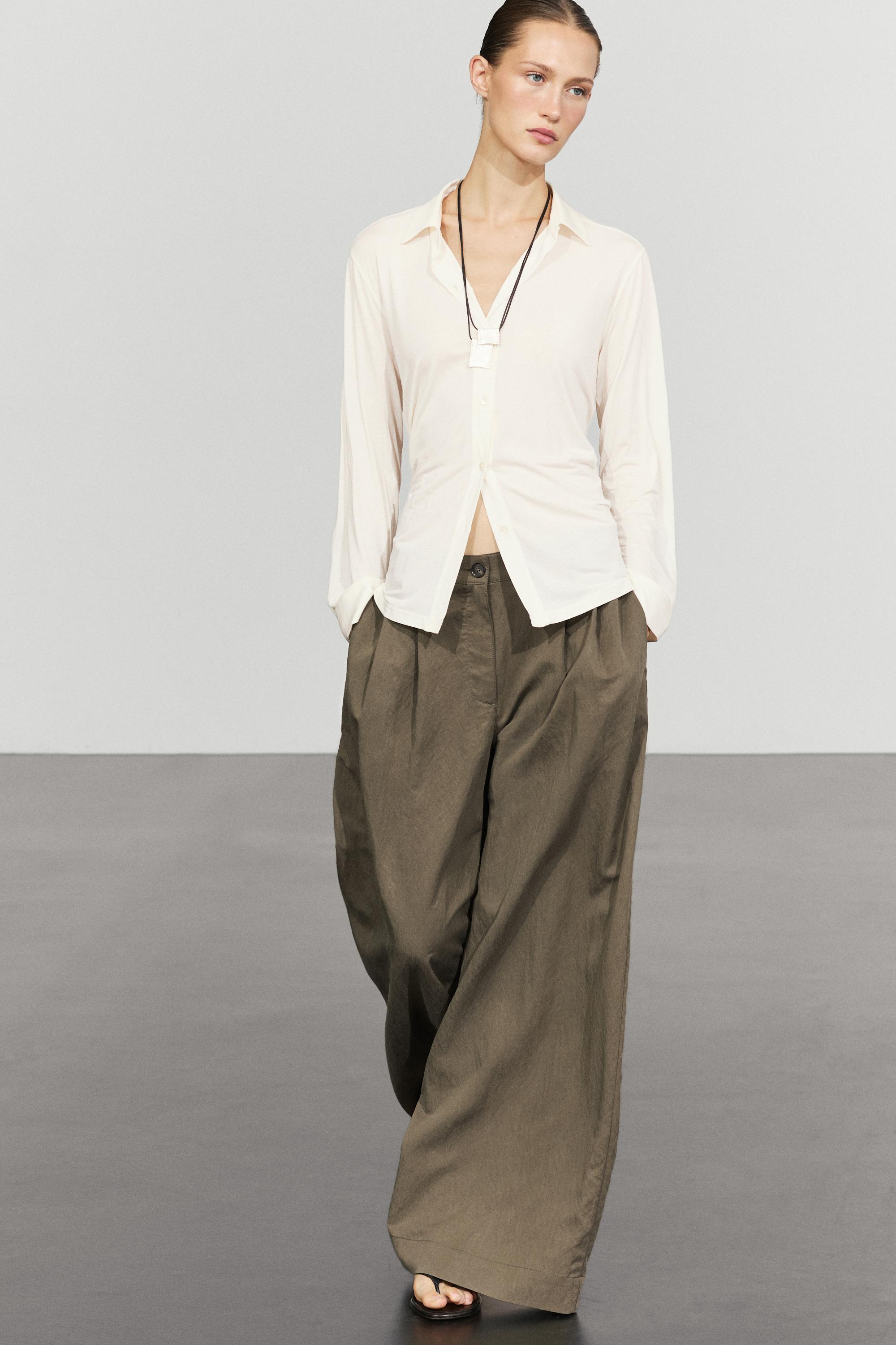 Technical wide-leg pleated pants