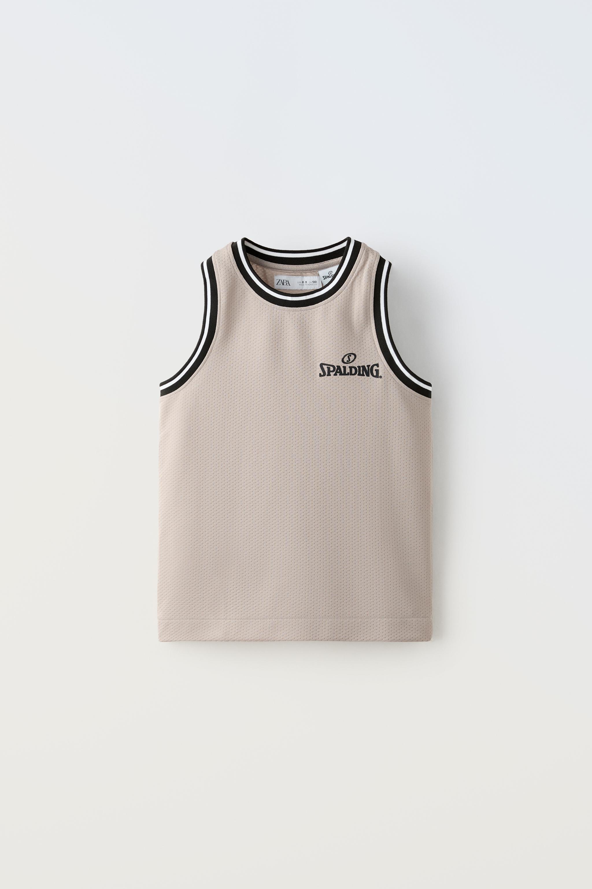 SPALDING ® PIPED TANK TOP