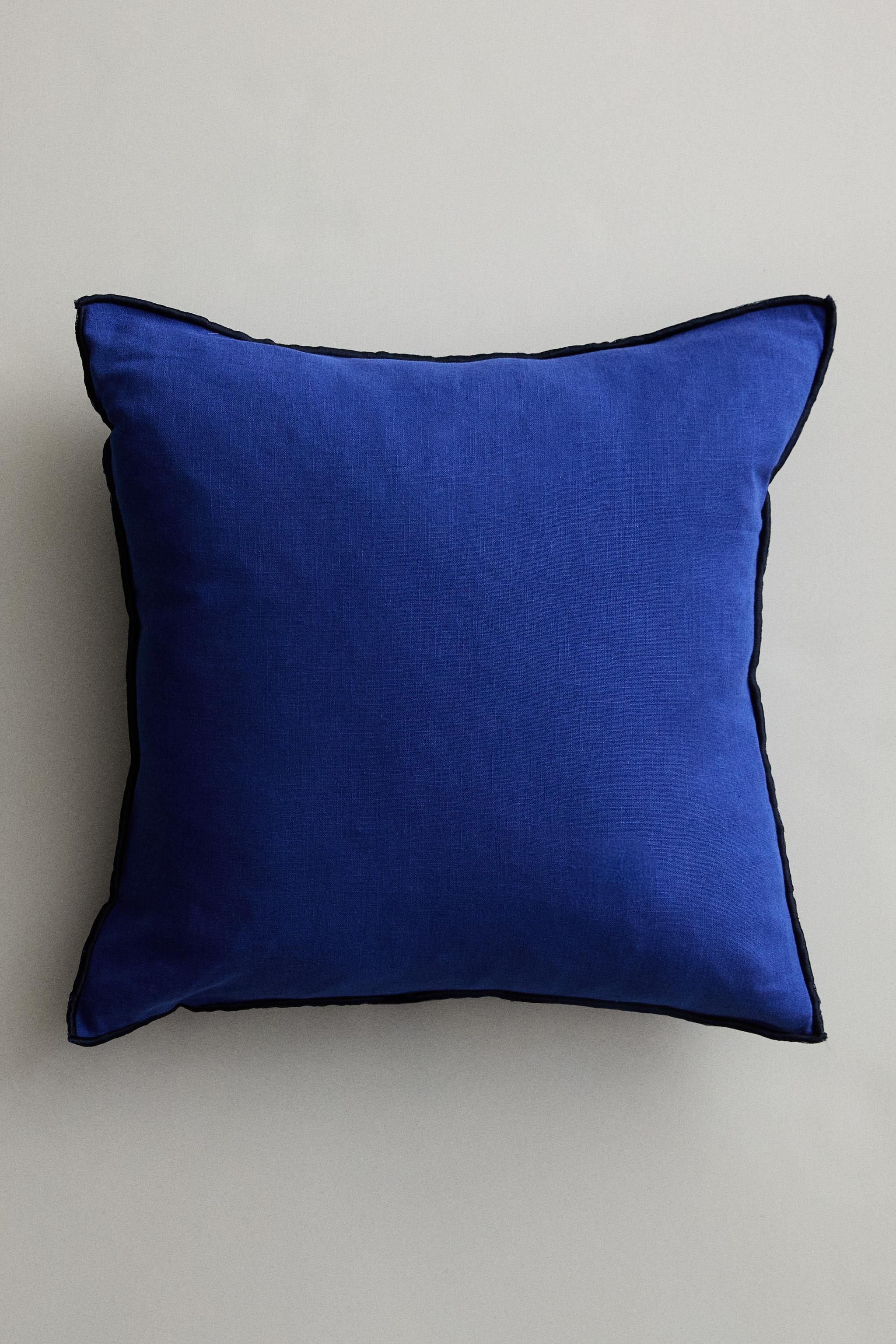 HOUSSE DE COUSSIN OVERLOCK