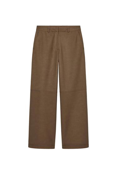 Brown wide-leg pants with side pockets and belt loops, on a white background.