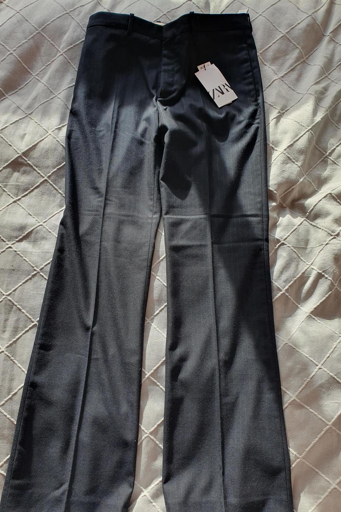 PINSTRIPED SLIM TROUSERS
