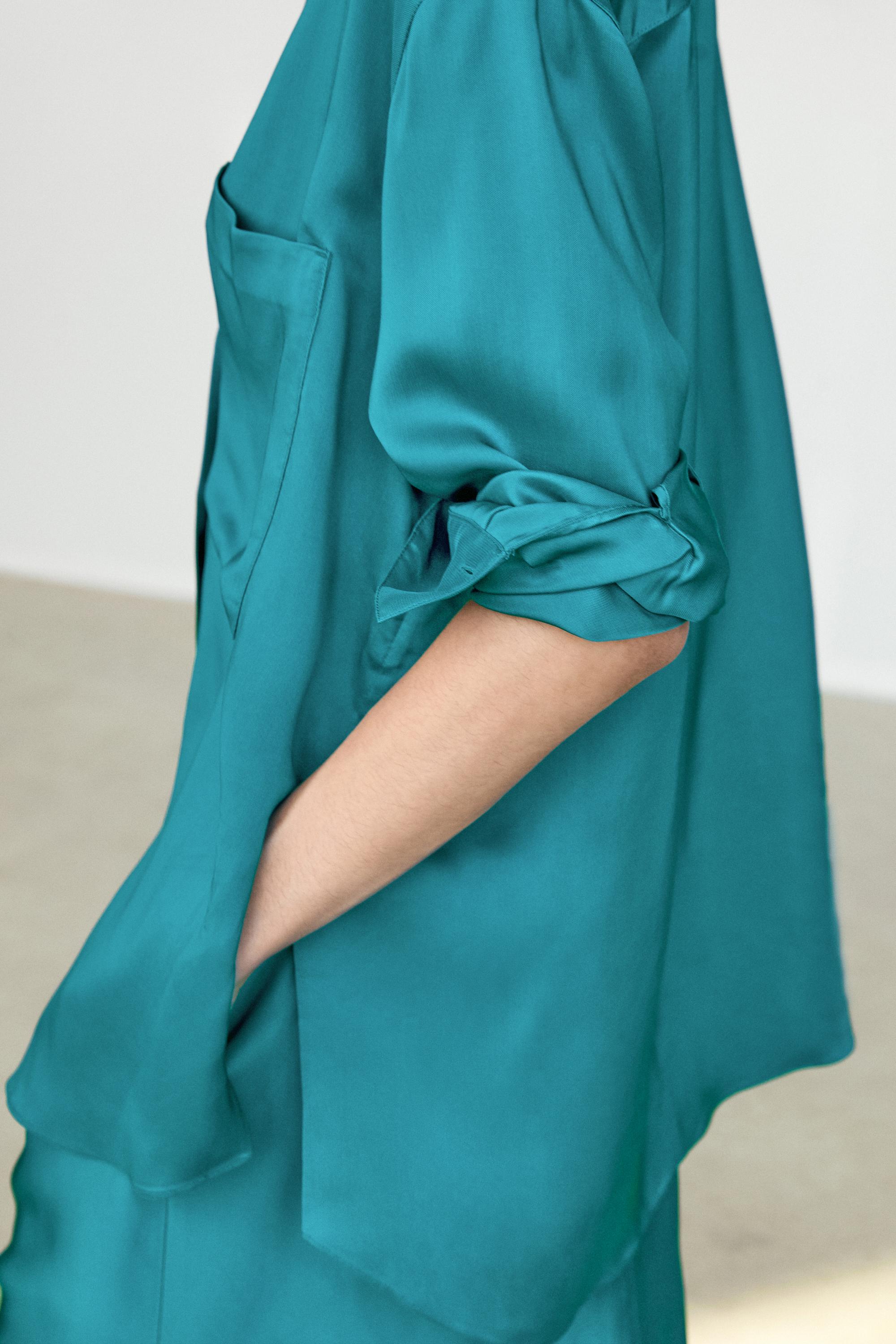Flowing satin shirt with pockets