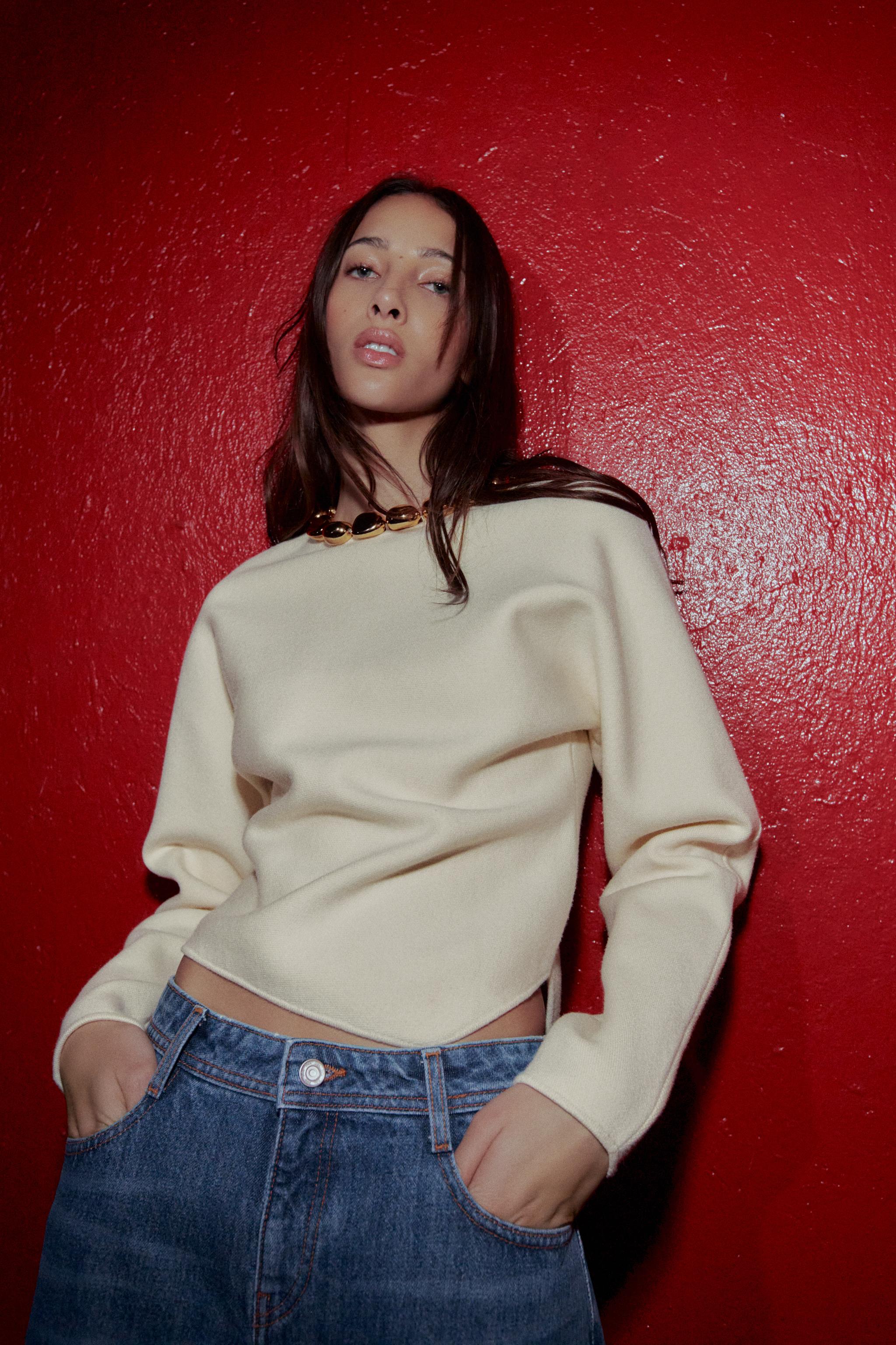 PULL EN MAILLE À BOULES COL