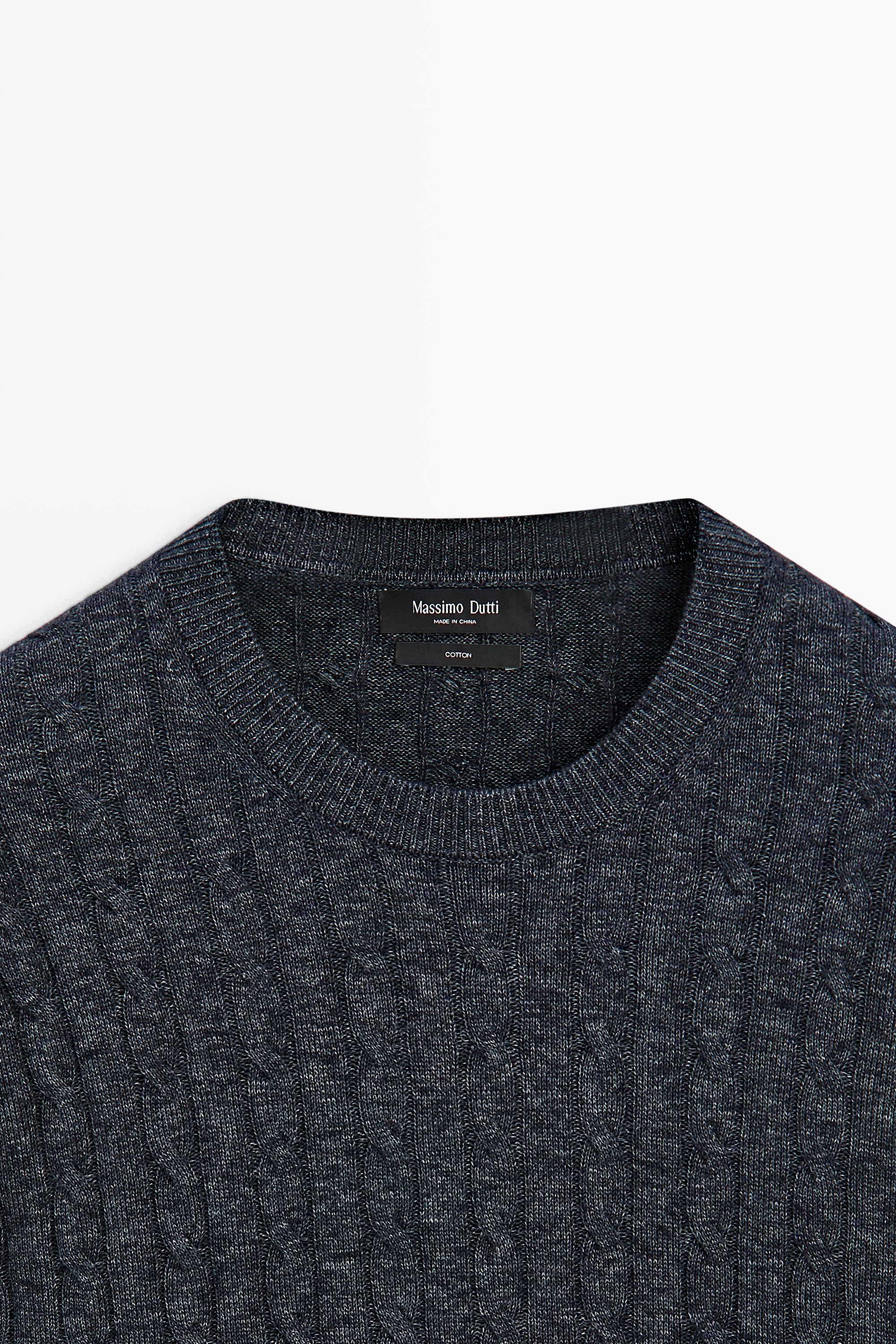 Cable knit round neck sweater