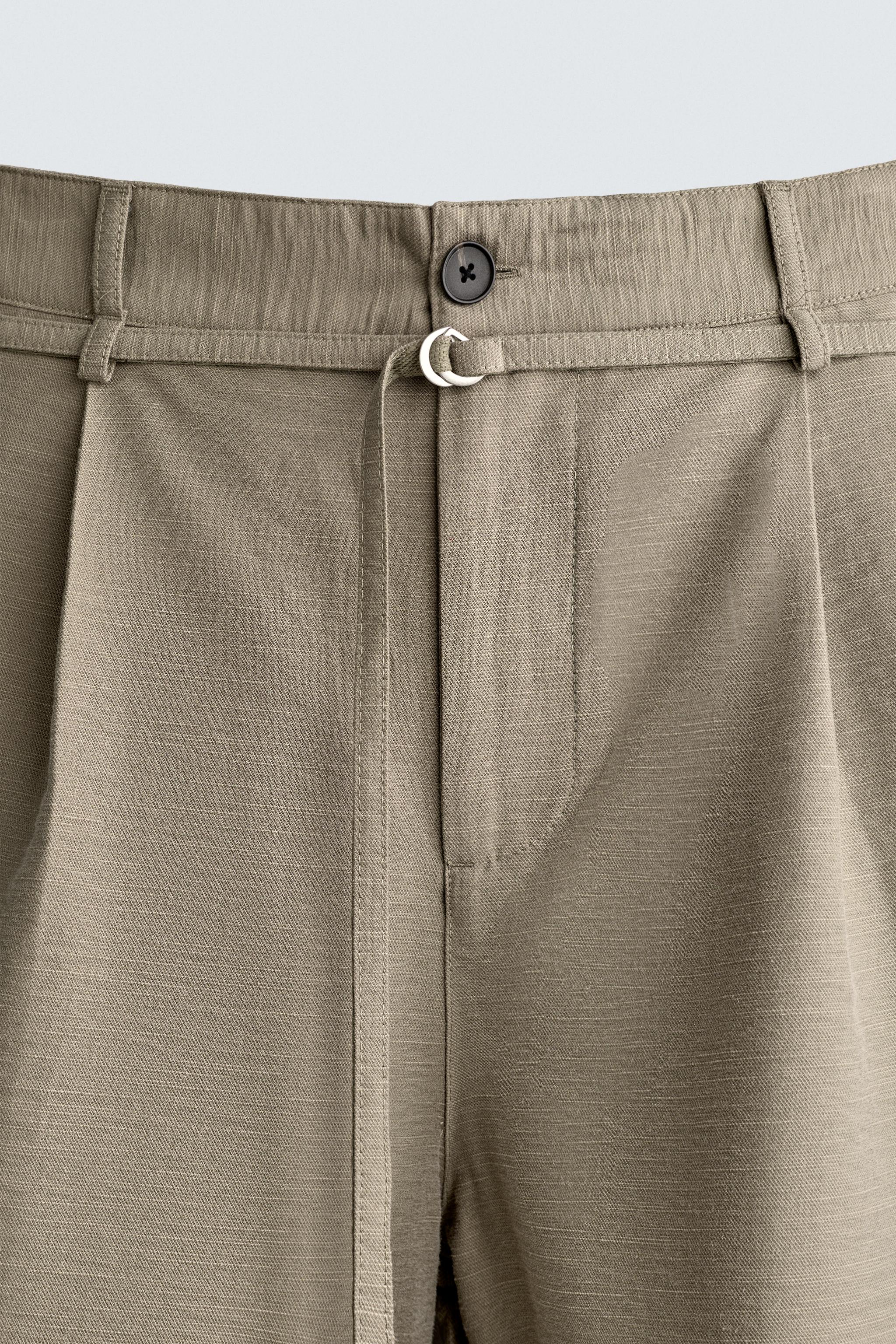 BERMUDA RELAXED FIT À PLIS ET CEINTURE
