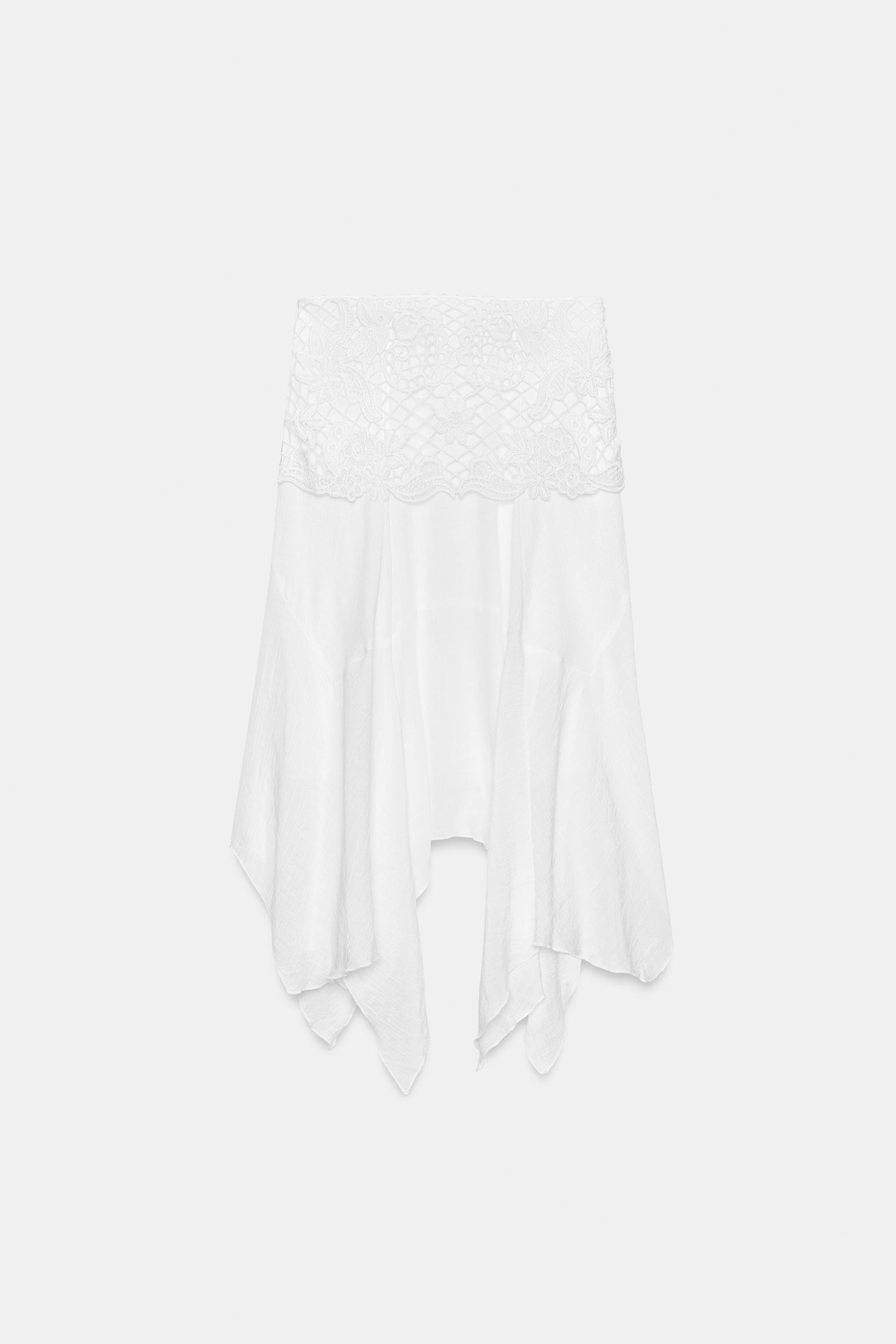JUPE MI-LONGUE ASYMÉTRIQUE BRODÉE