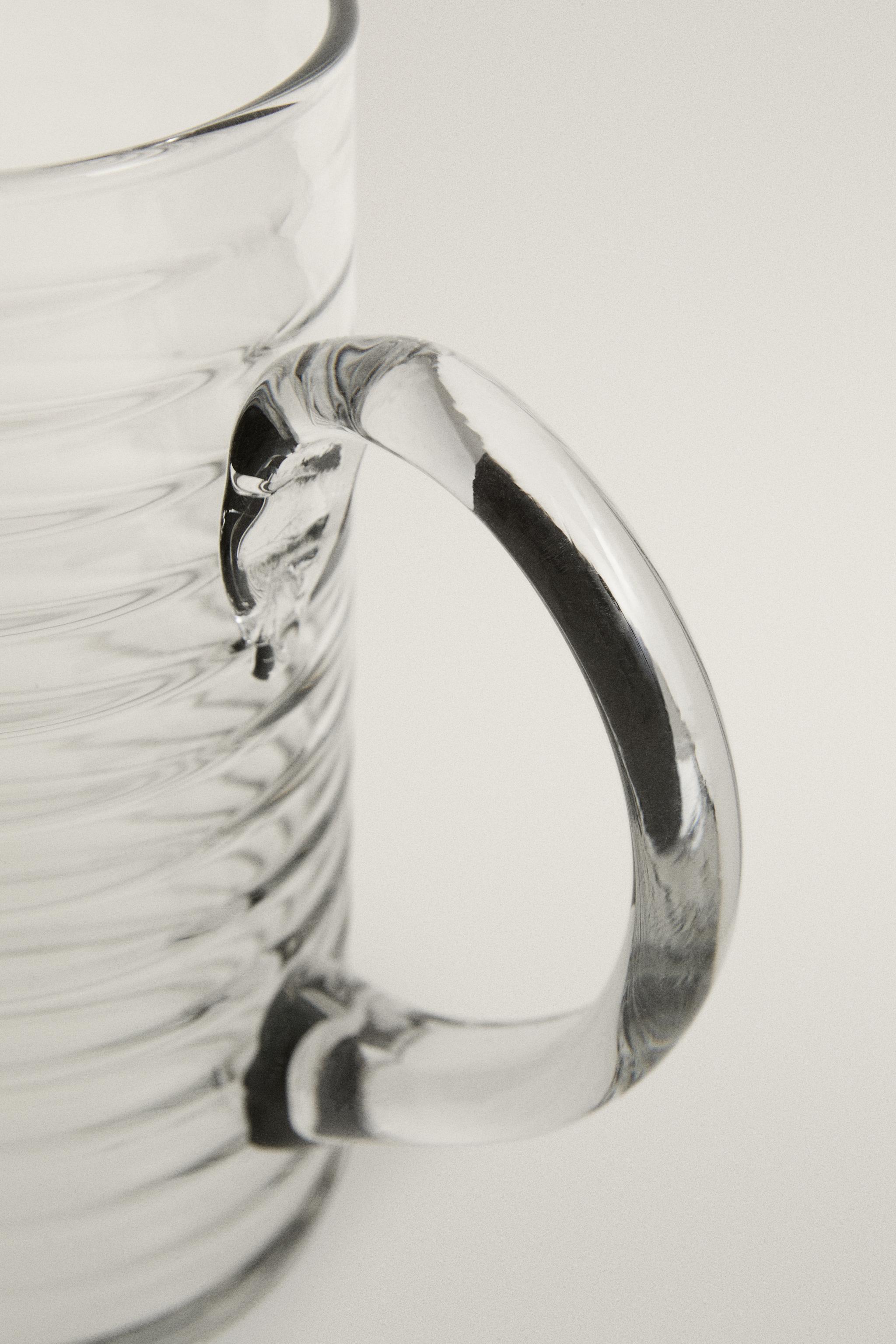 GLASS PITCHER WITH RAISED LINES