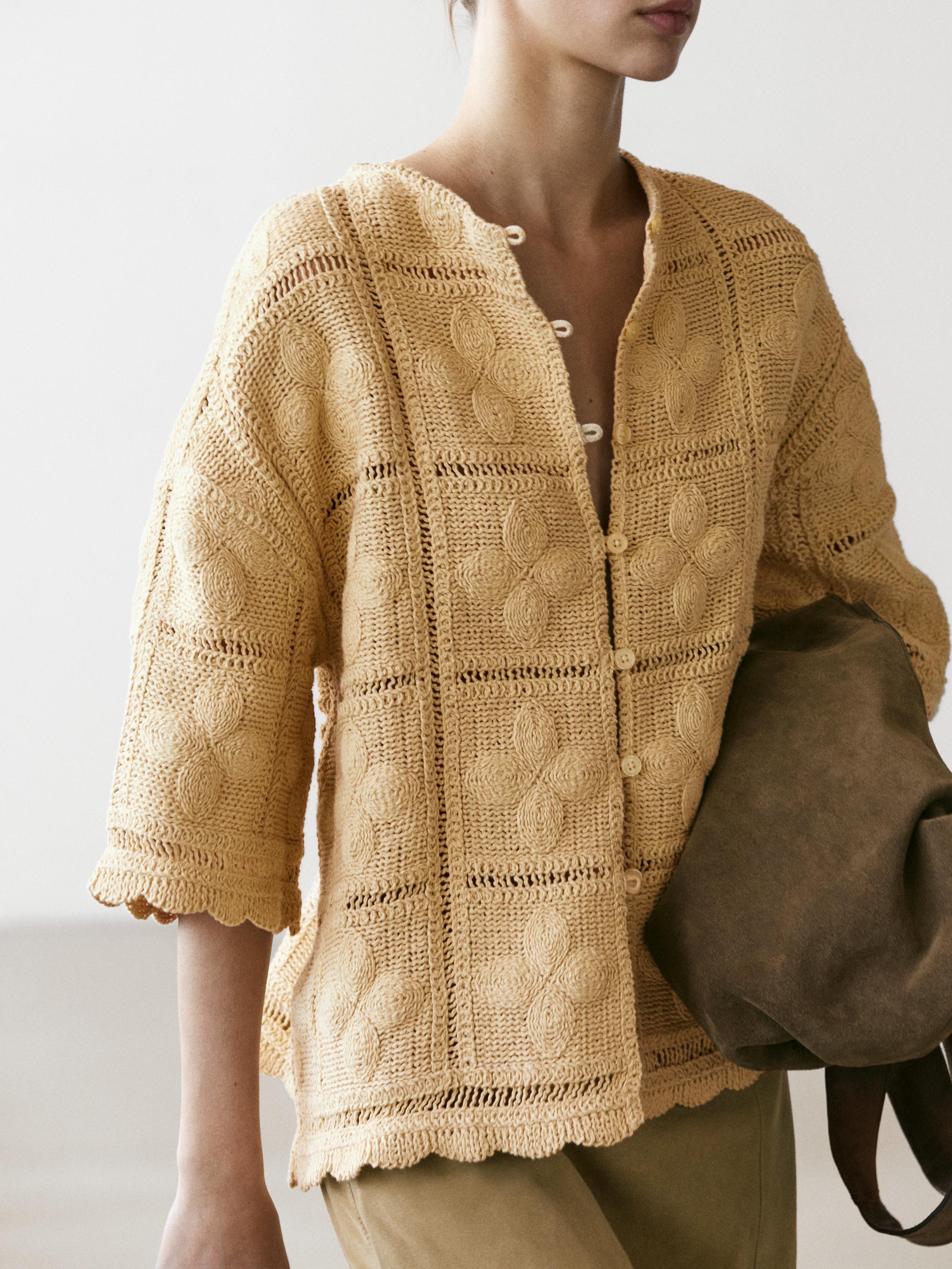 Veste en maille ajourée et crochet
