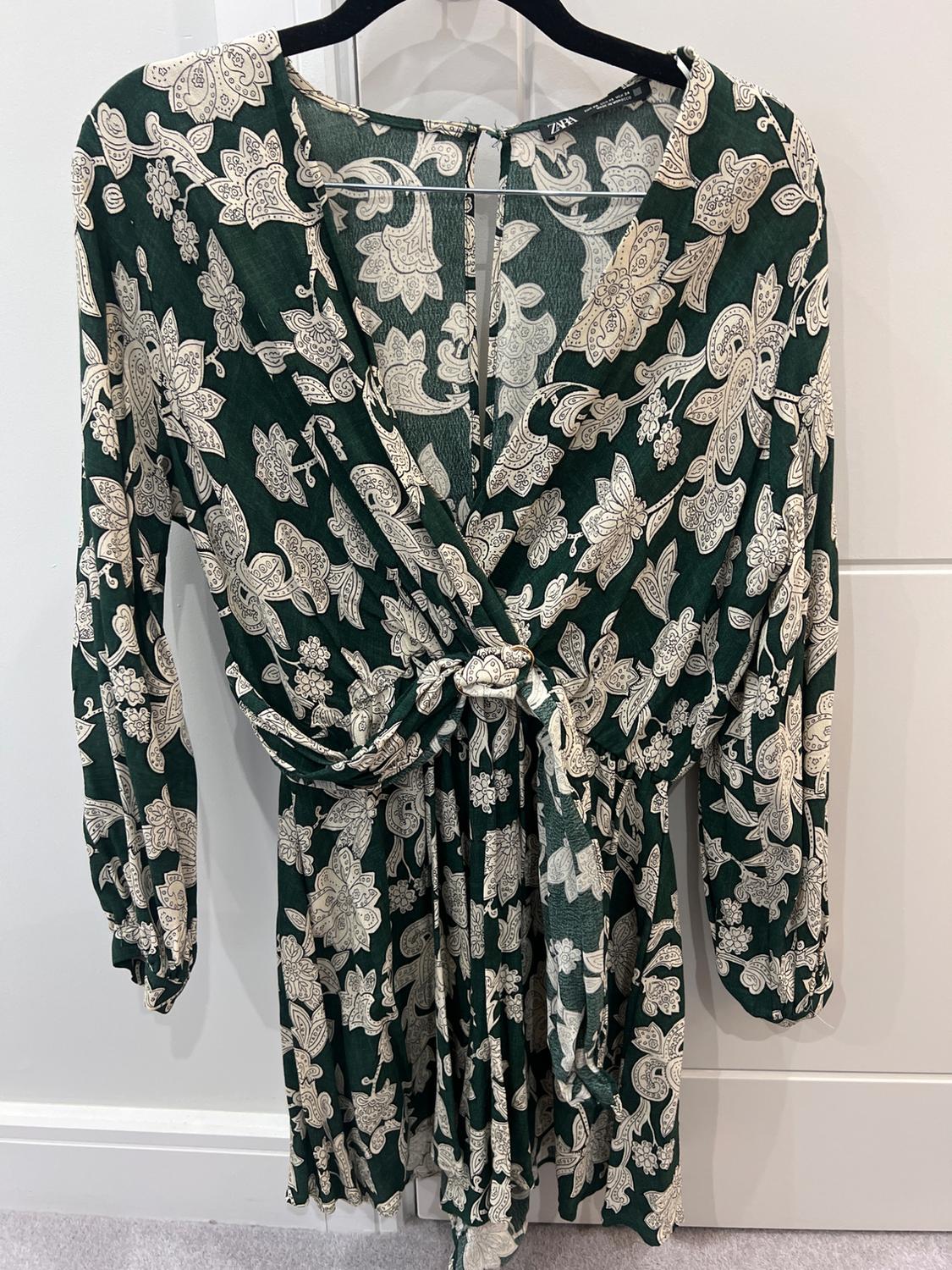 PRINTED JUMPSUIT WITH BUCKLE