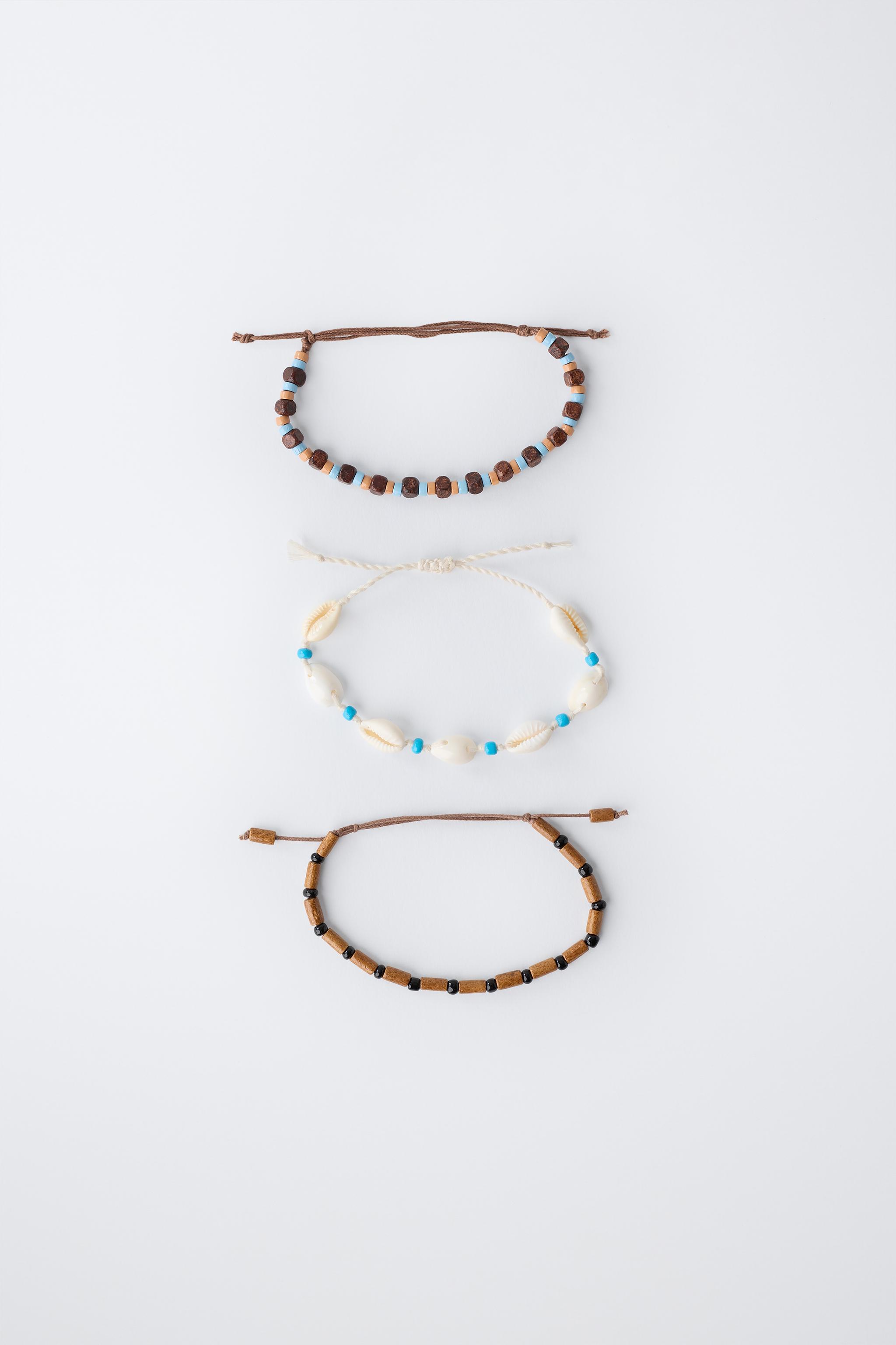 LOT DE TROIS BRACELETS FANTAISIE COQUILLAGES