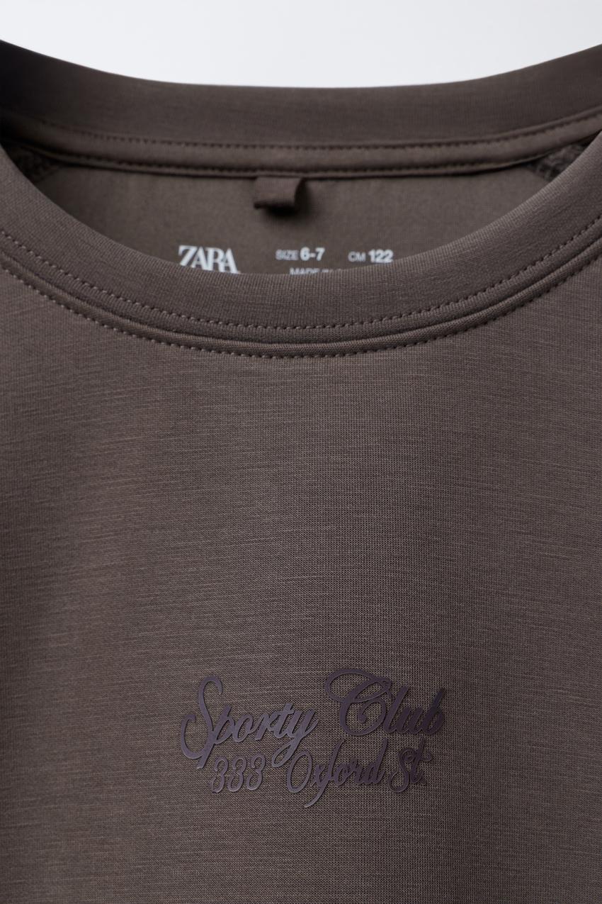 SPORTY SWEATSHIRT WITH RAISED SLOGAN