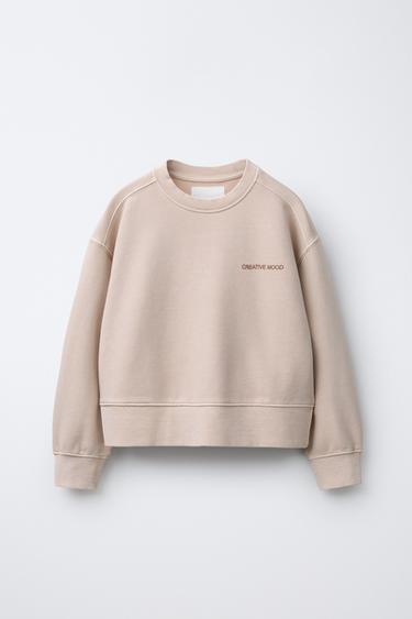 BLUZË HOODIE TEKST ME EFEKT TË ZBARDHUR - Rozë e zbehtë nga Zara