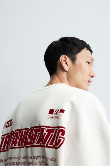 SWEAT-SHIRT À TEXTES IMPRIMÉS - Blanc cassé de Zara - Image 6