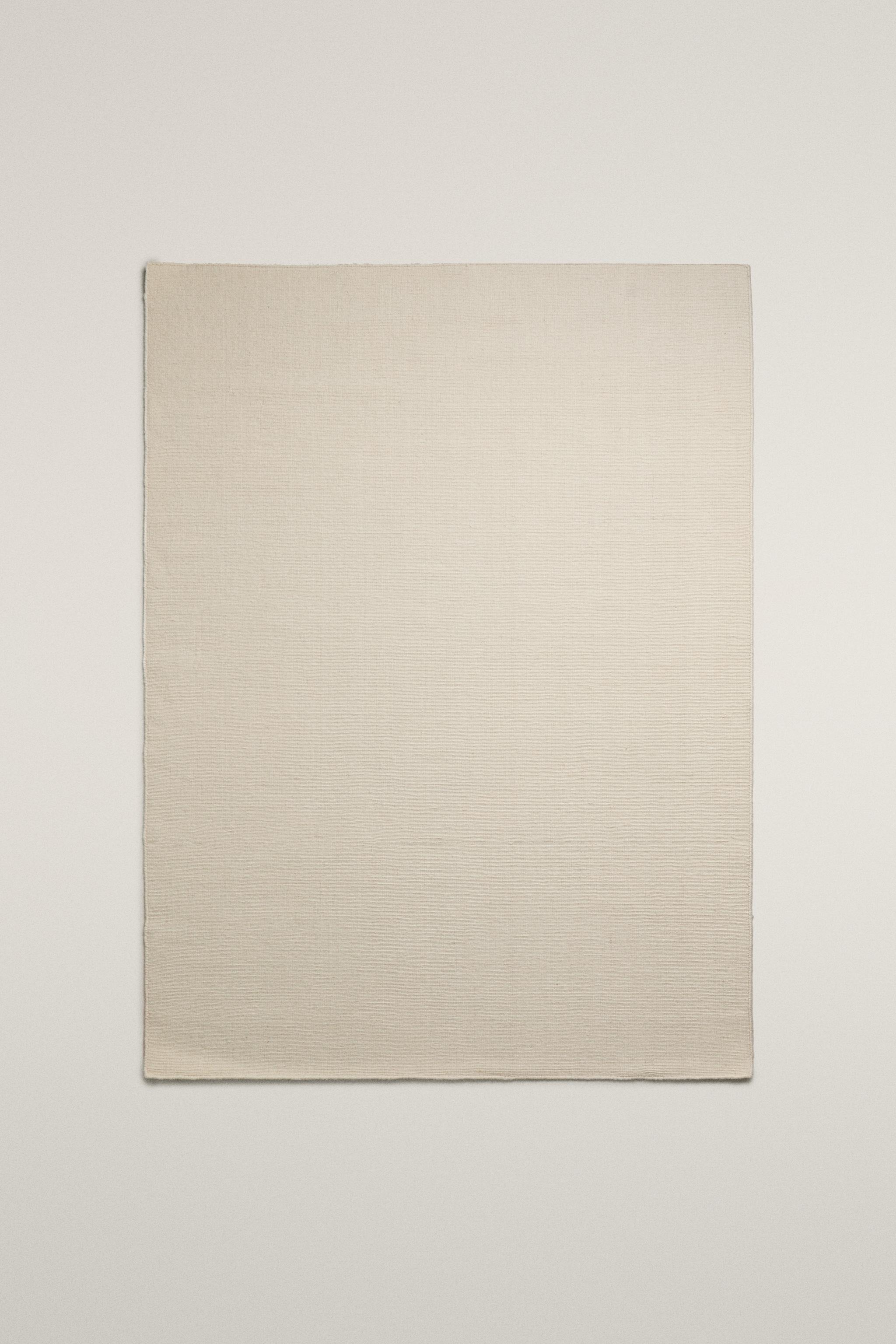 WOOL AREA RUG WITH SCALLOPED LINES