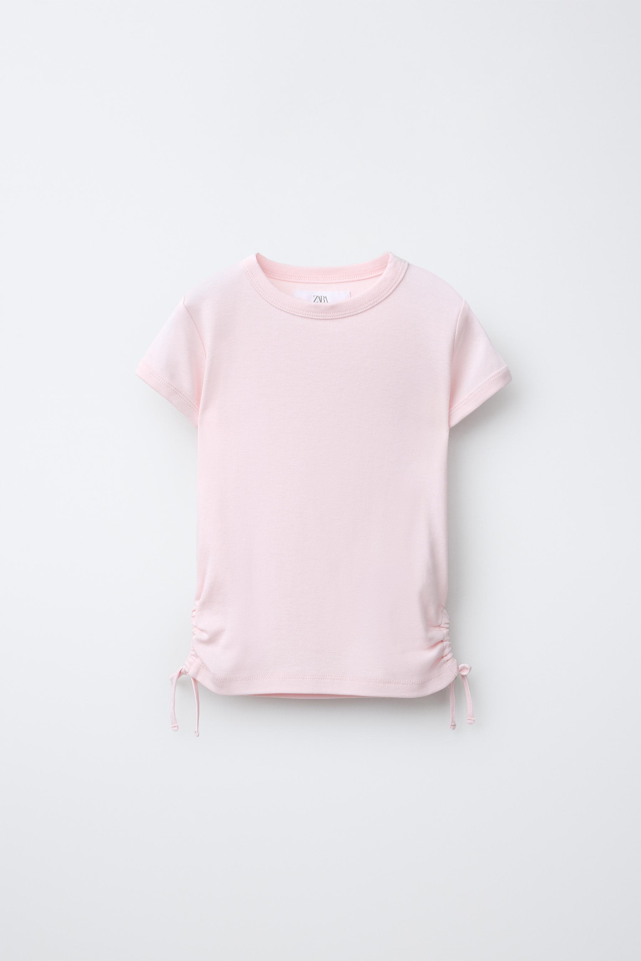 MODAL T-SHIRT WITH CUT OUTS AND BOWS
