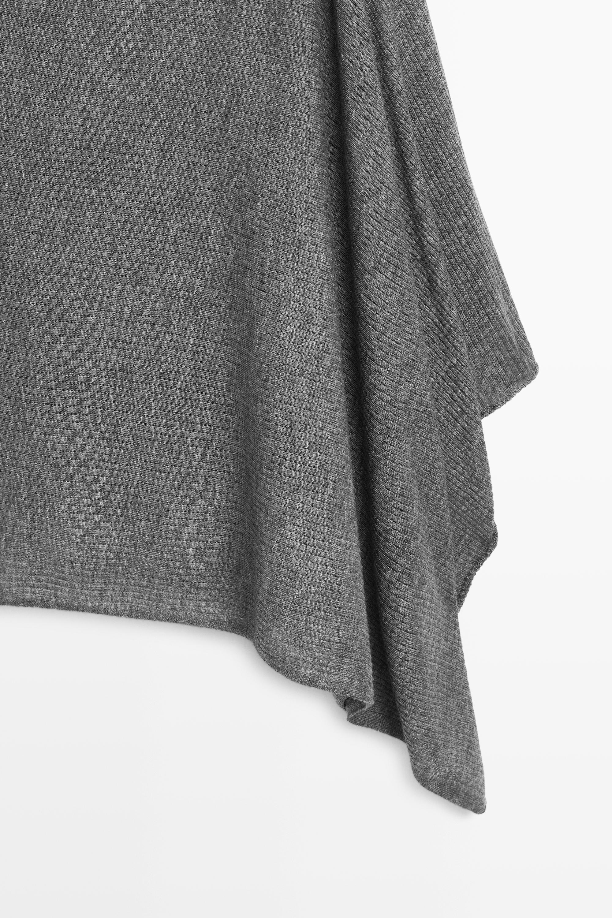 Cape en maille fine