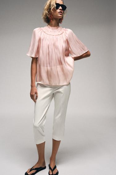 Blusa con efecto brillo