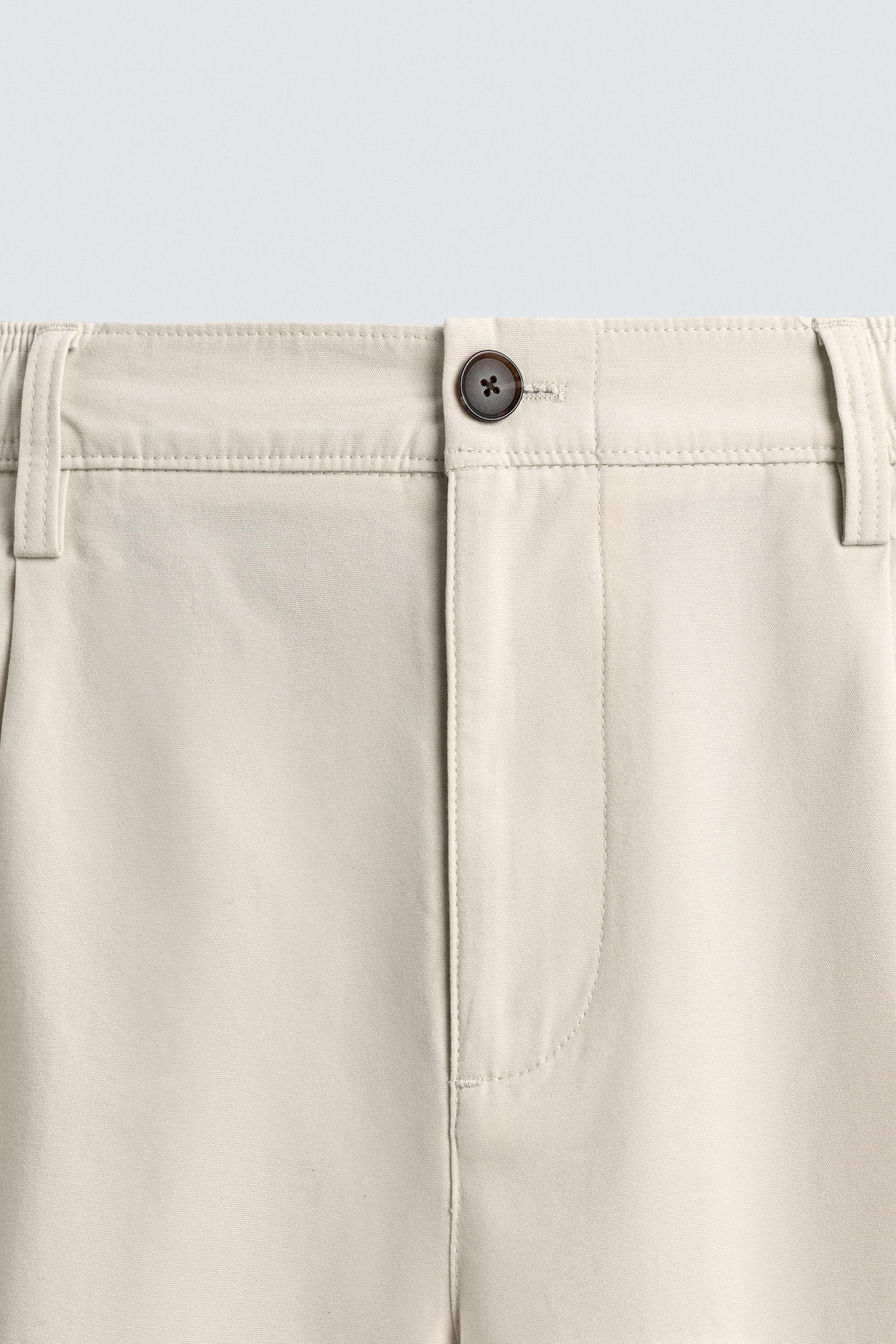 PLEATED STRAIGHT FIT PANTS