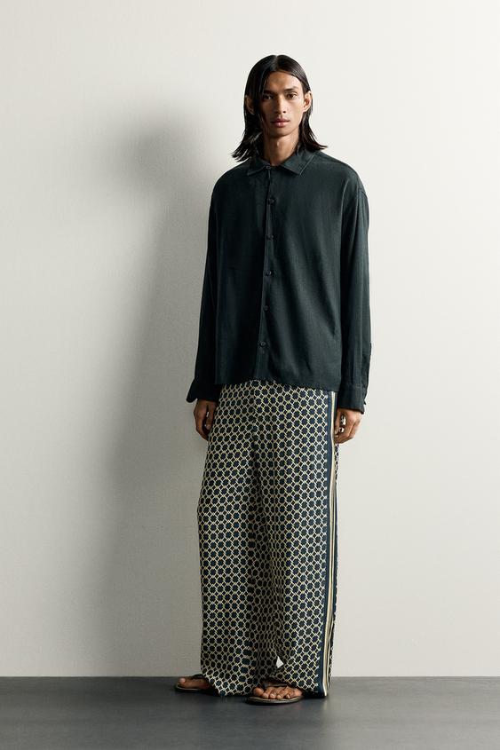LIMITED EDITION YAN ŞERİTLİ DÖKÜMLÜ PANTOLON