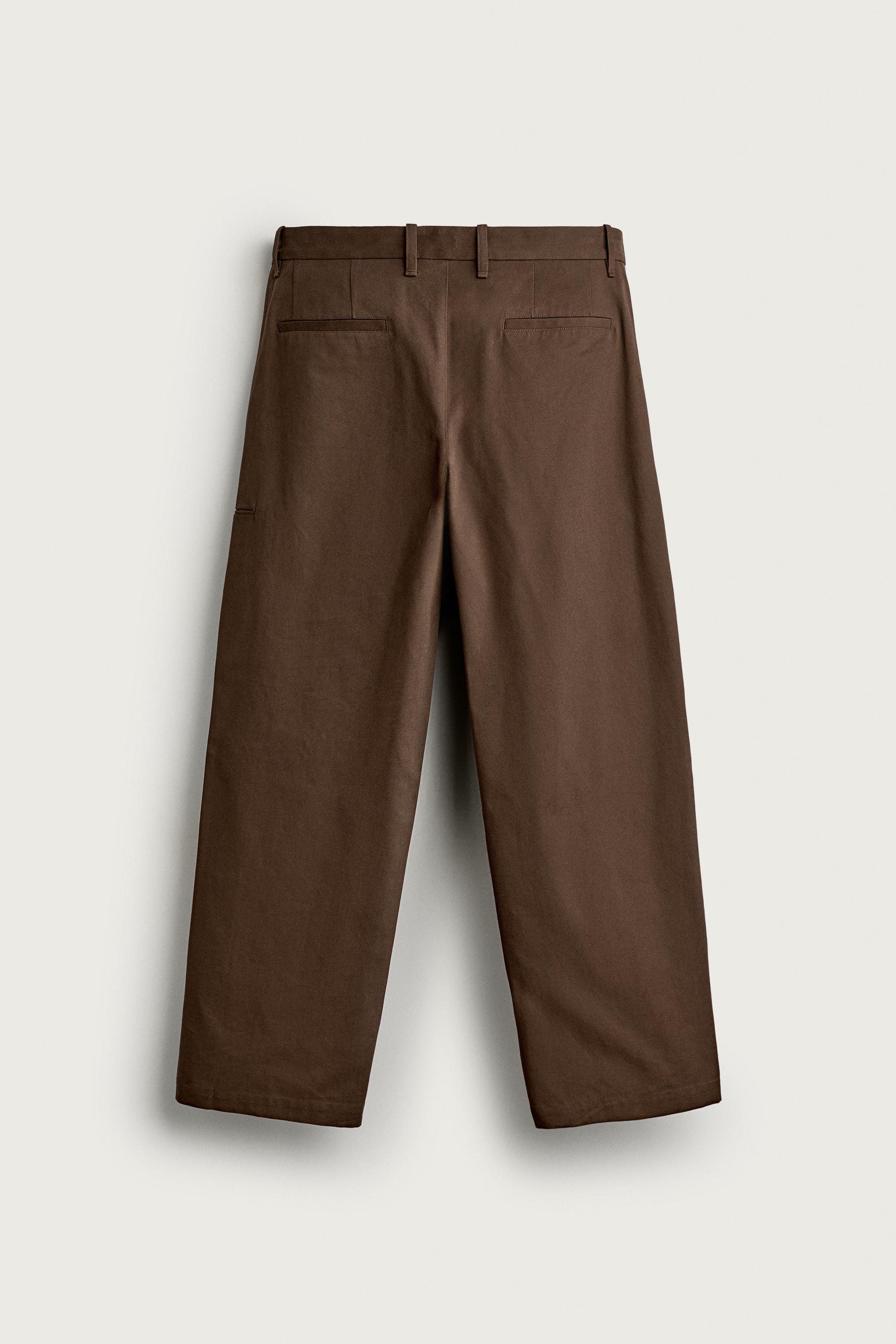 RELAXED FIT PLEATED PANTS