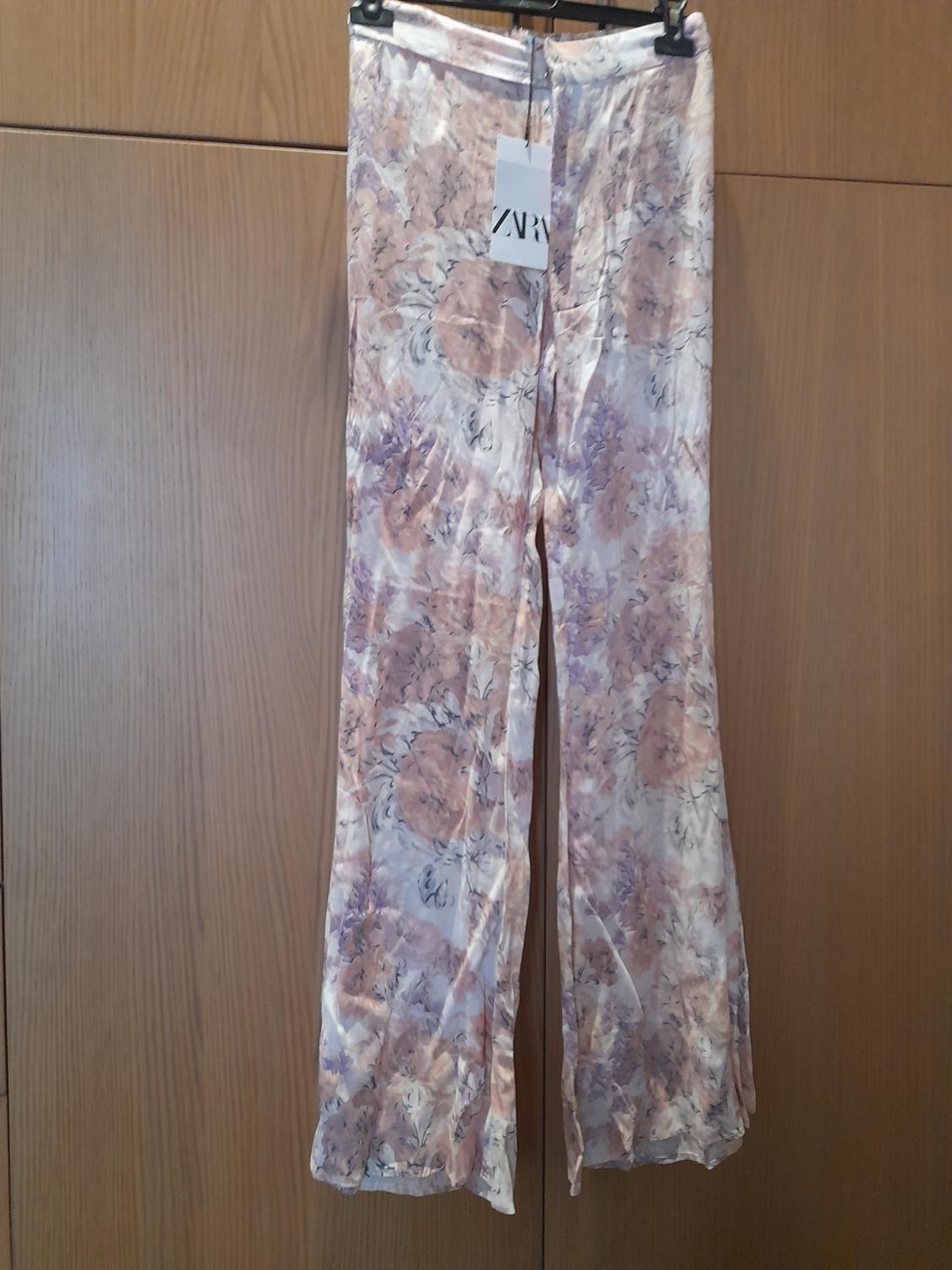 FLORAL PRINT FLARED TROUSERS