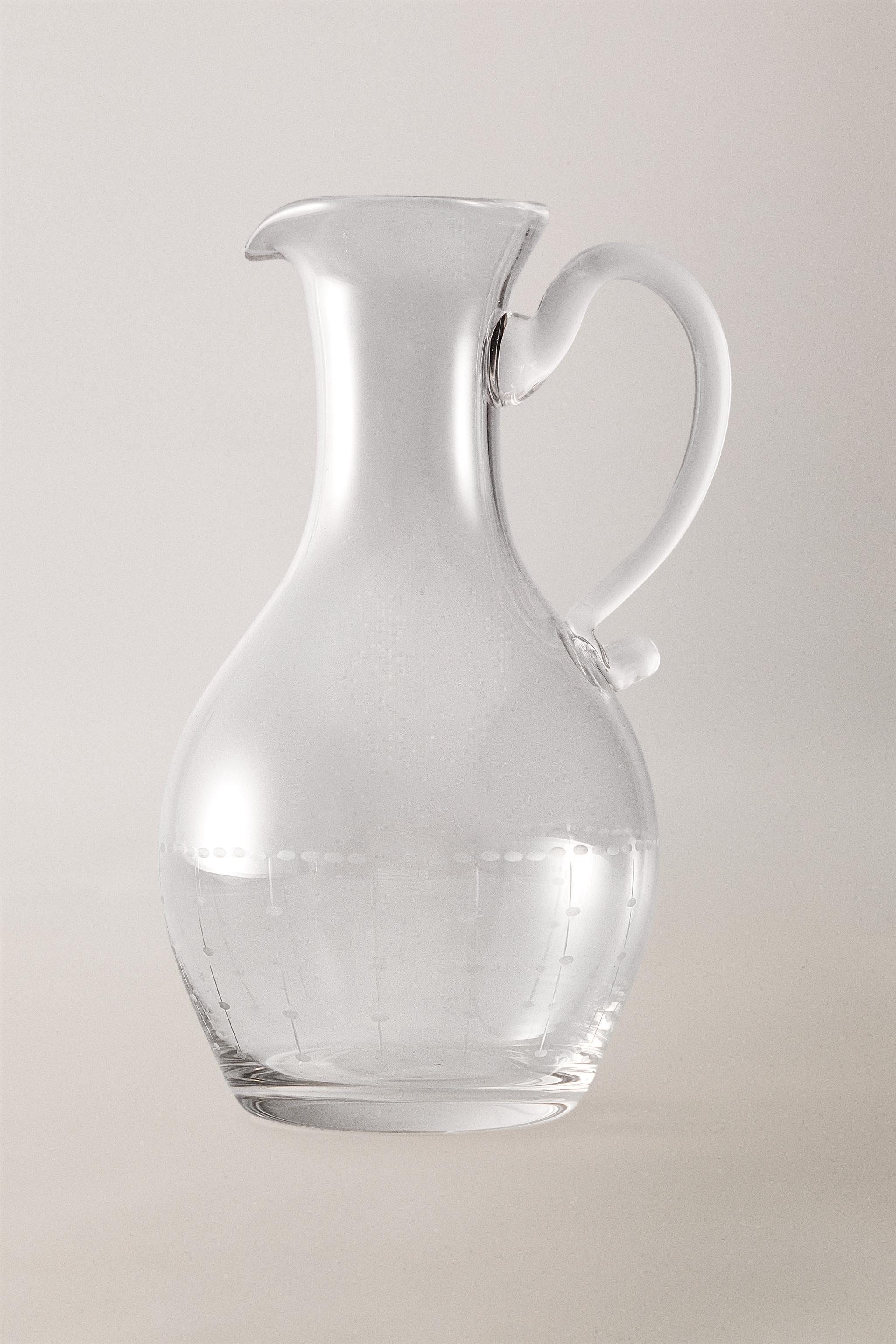 GEOMETRICALLY ENGRAVED GLASS PITCHER