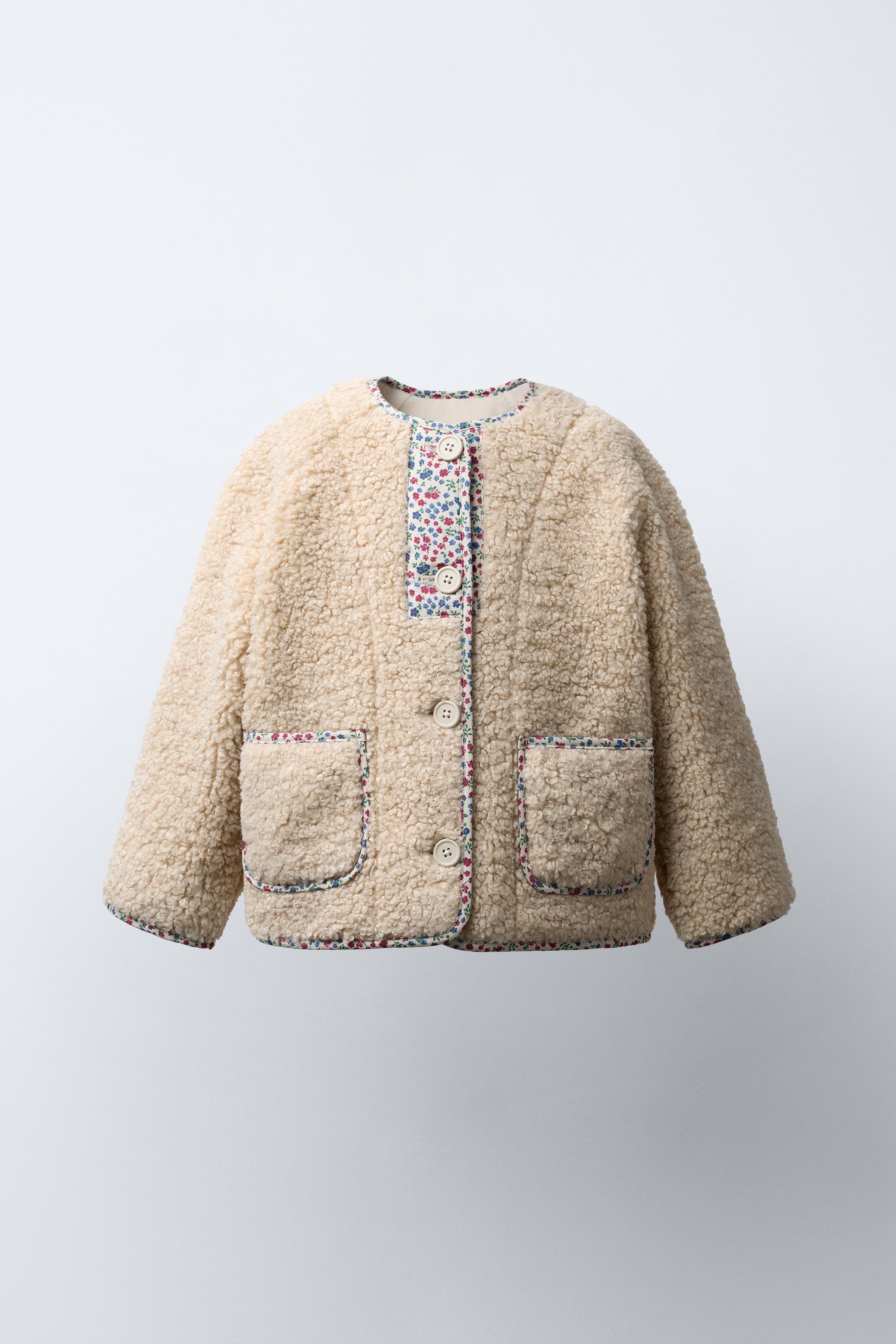 FLEECE JACKET WITH FLORAL TRIM