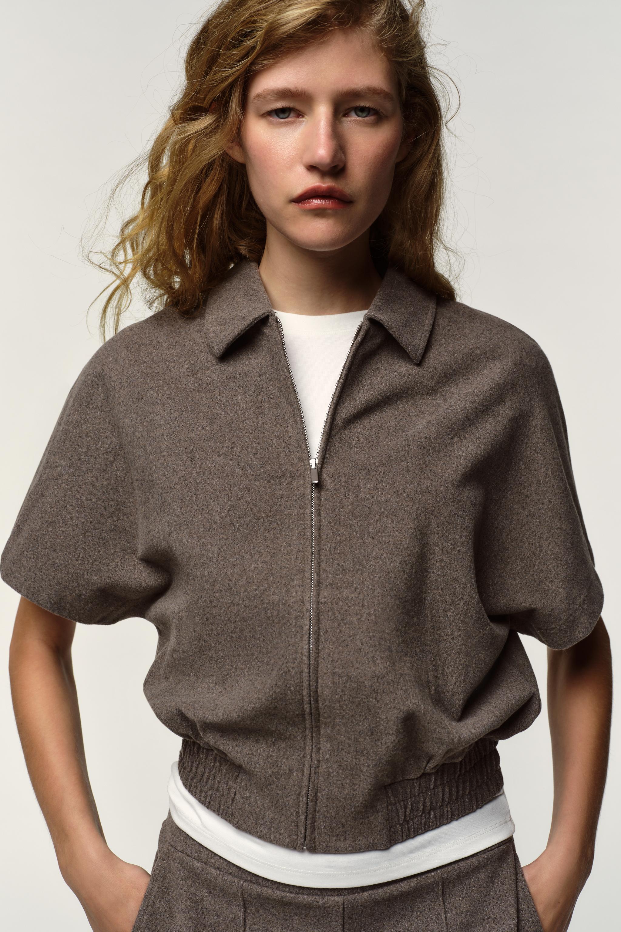 VESTE SOUPLE À MANCHES COURTES