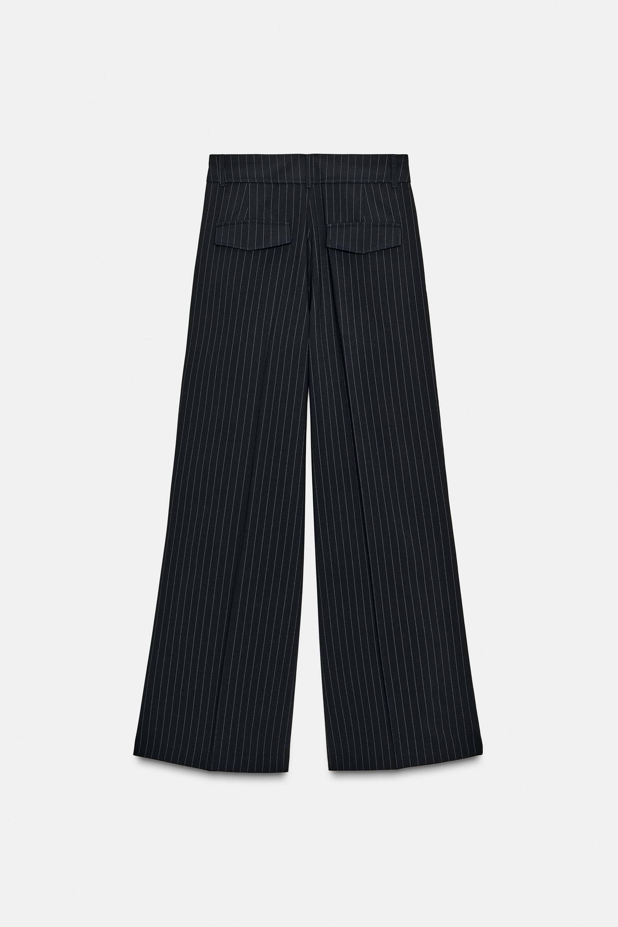 PINSTRIPE PANTS WITH PLEATS AND FLAPS