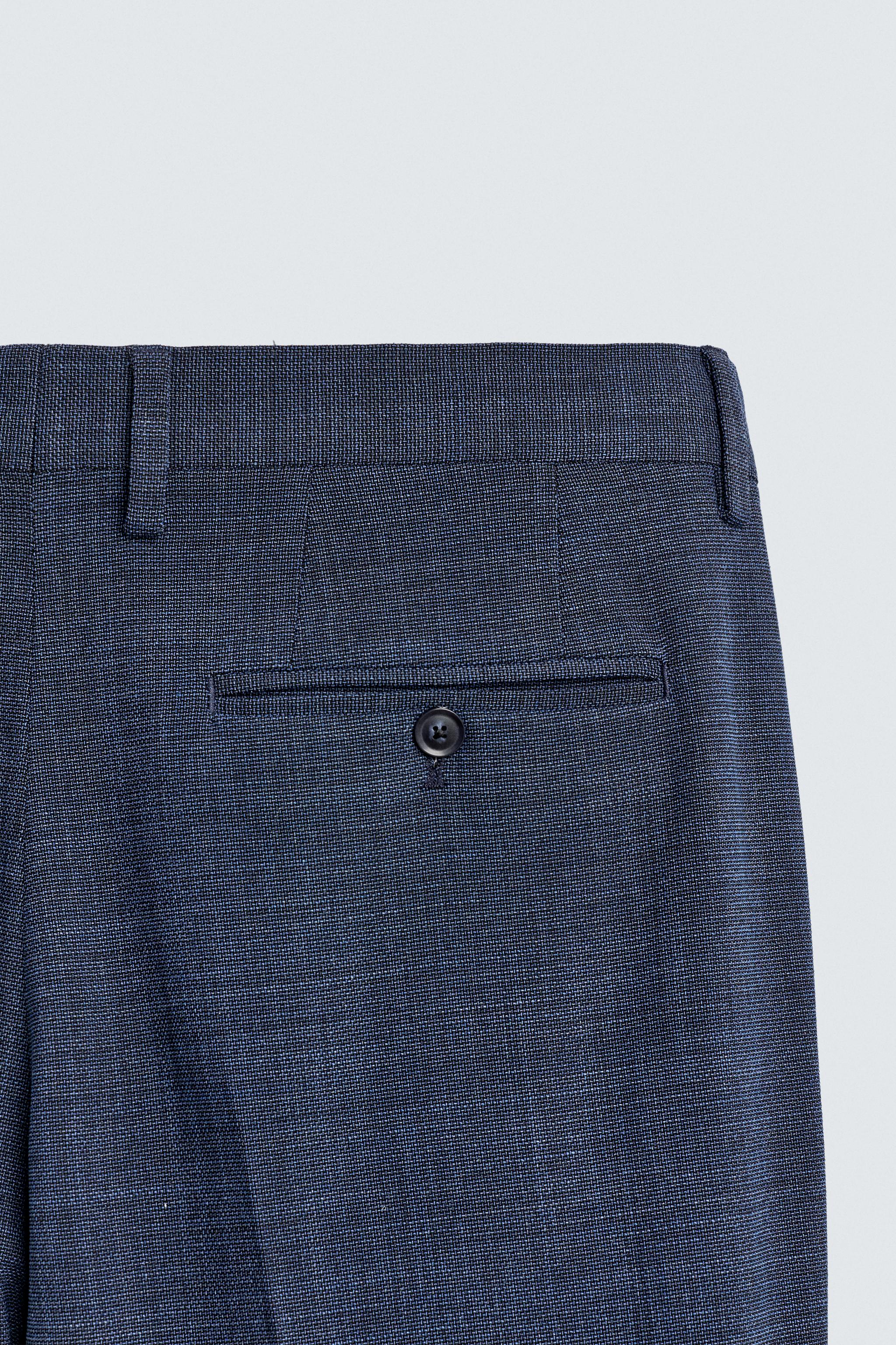 TEXTURED SUIT PANTS