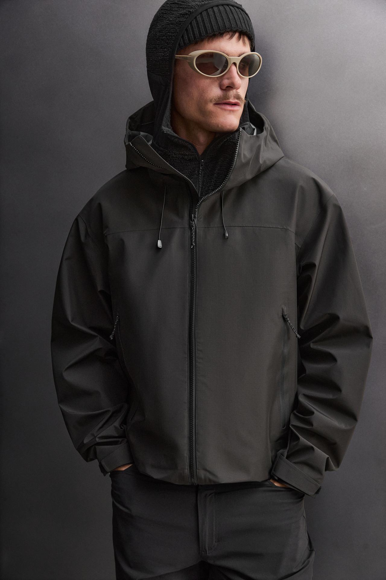 WATERPROOF TECHNICAL JACKET — Black