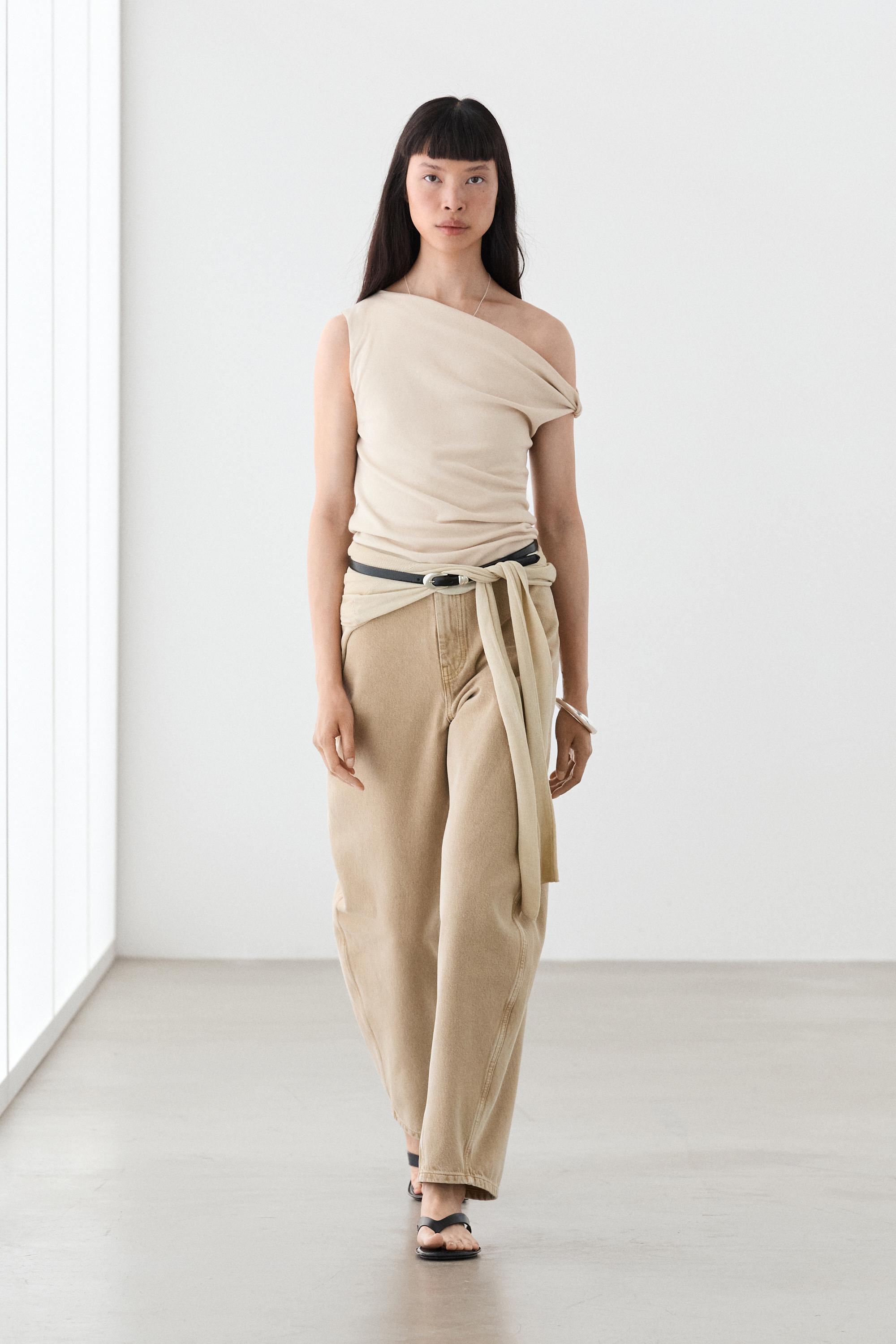 Asymmetric drop sleeve top — Sand