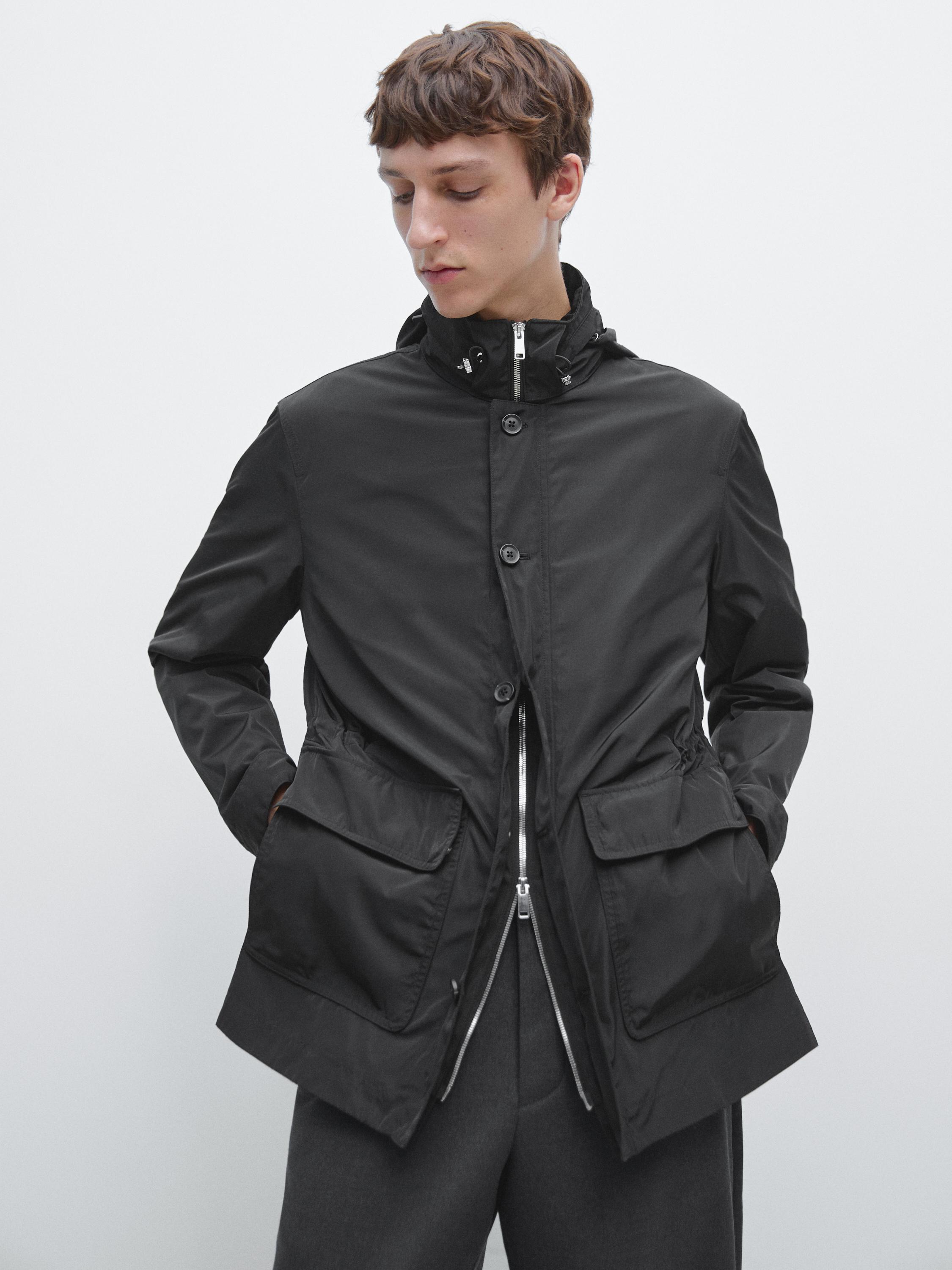 Hooded parka with fabric detail