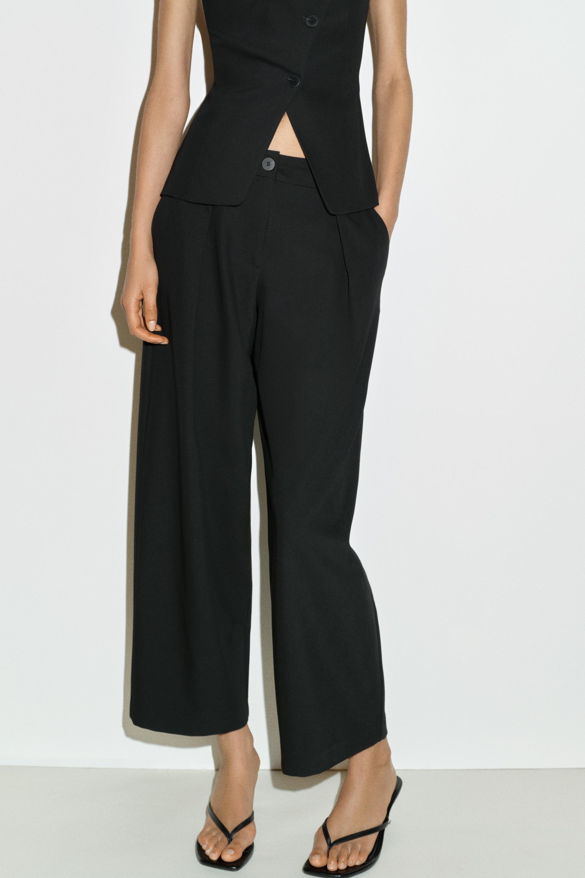 PLEATED TAPERED PANTS