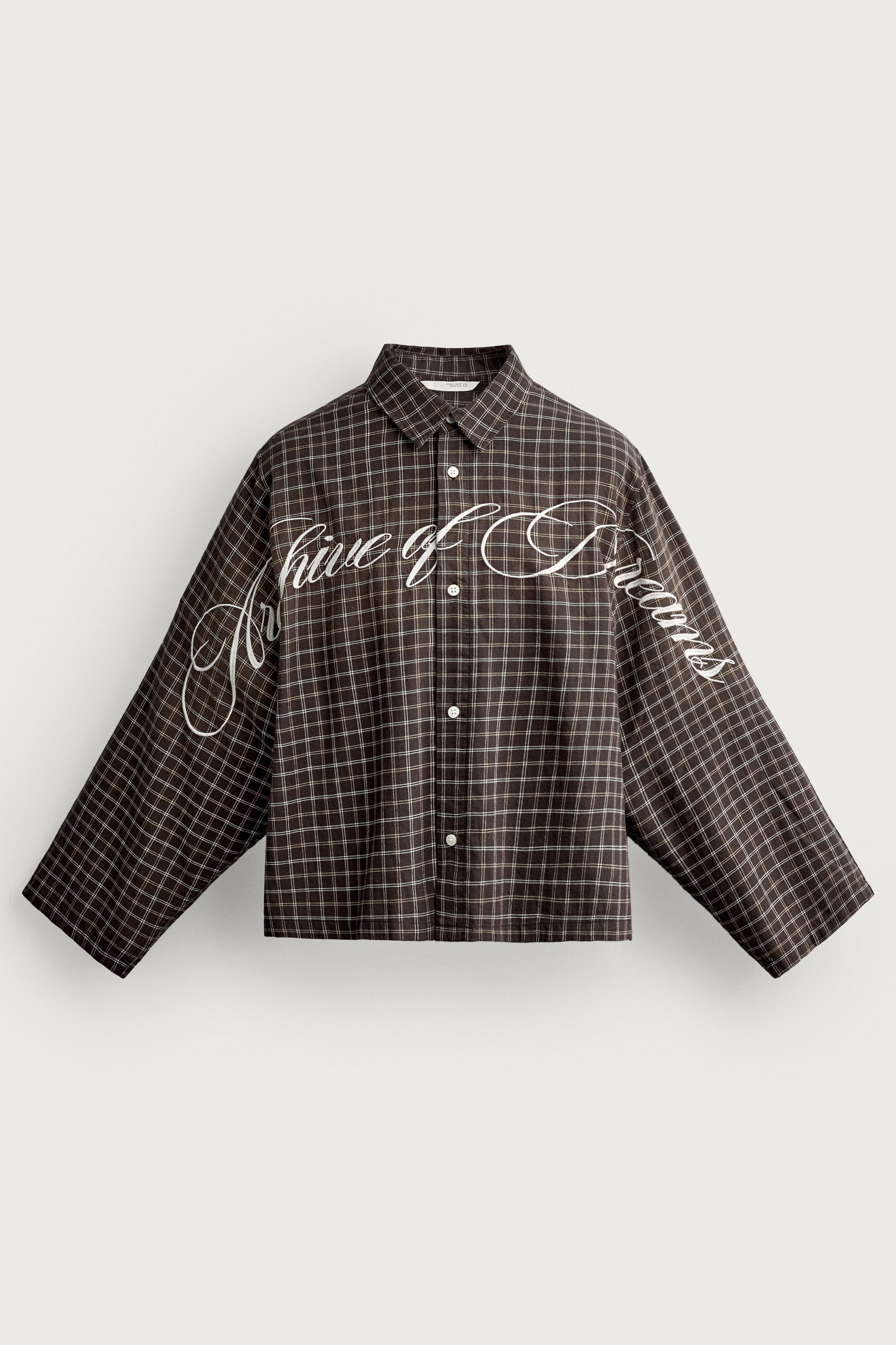 CAMISA BOXY FIT TEXTO BORDADO