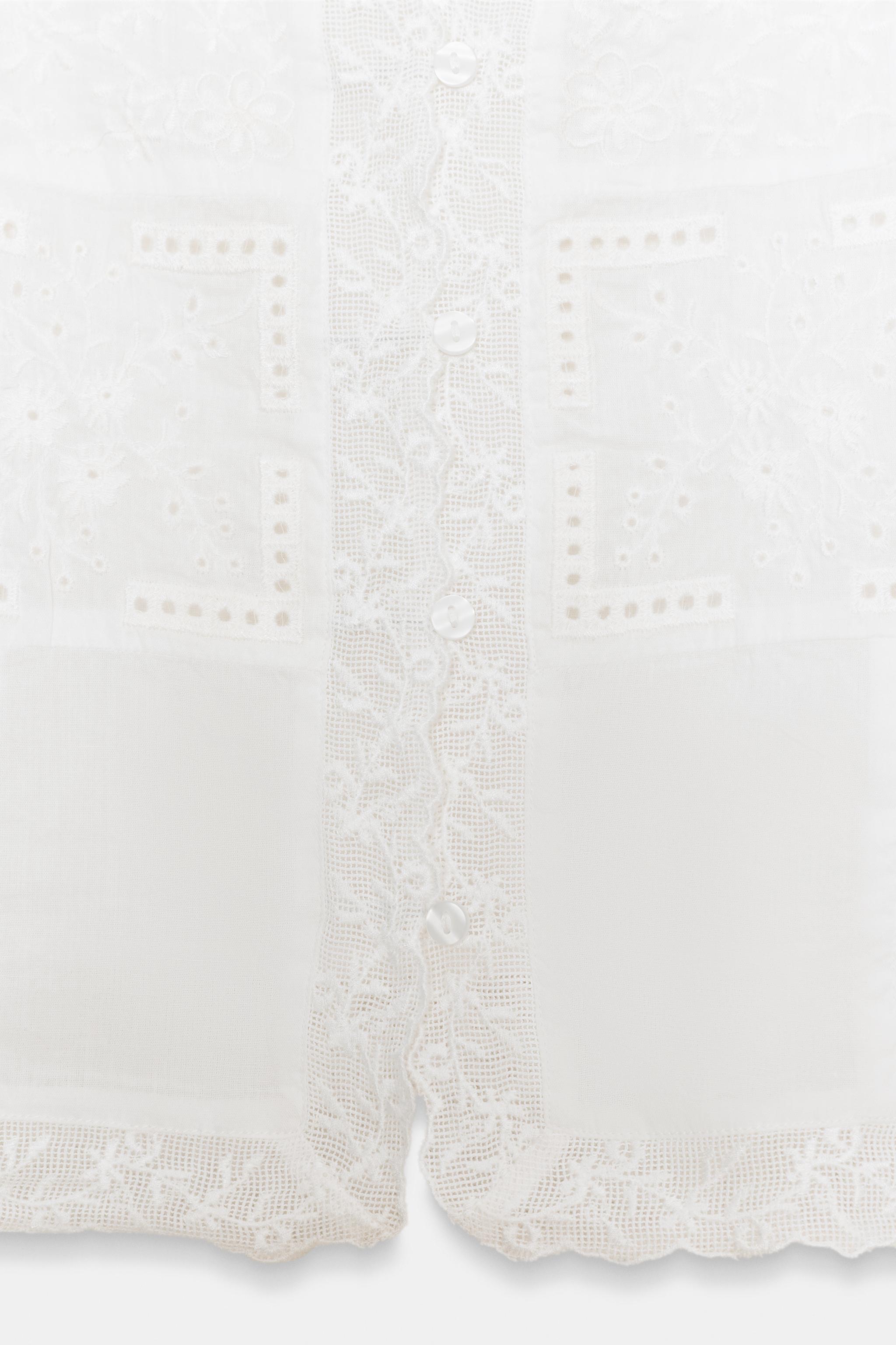 EMBROIDERED STRAP TOP