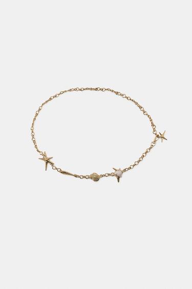 CINTURÓN METÁLICO CHARMS MARINOS - Dorado de Zara