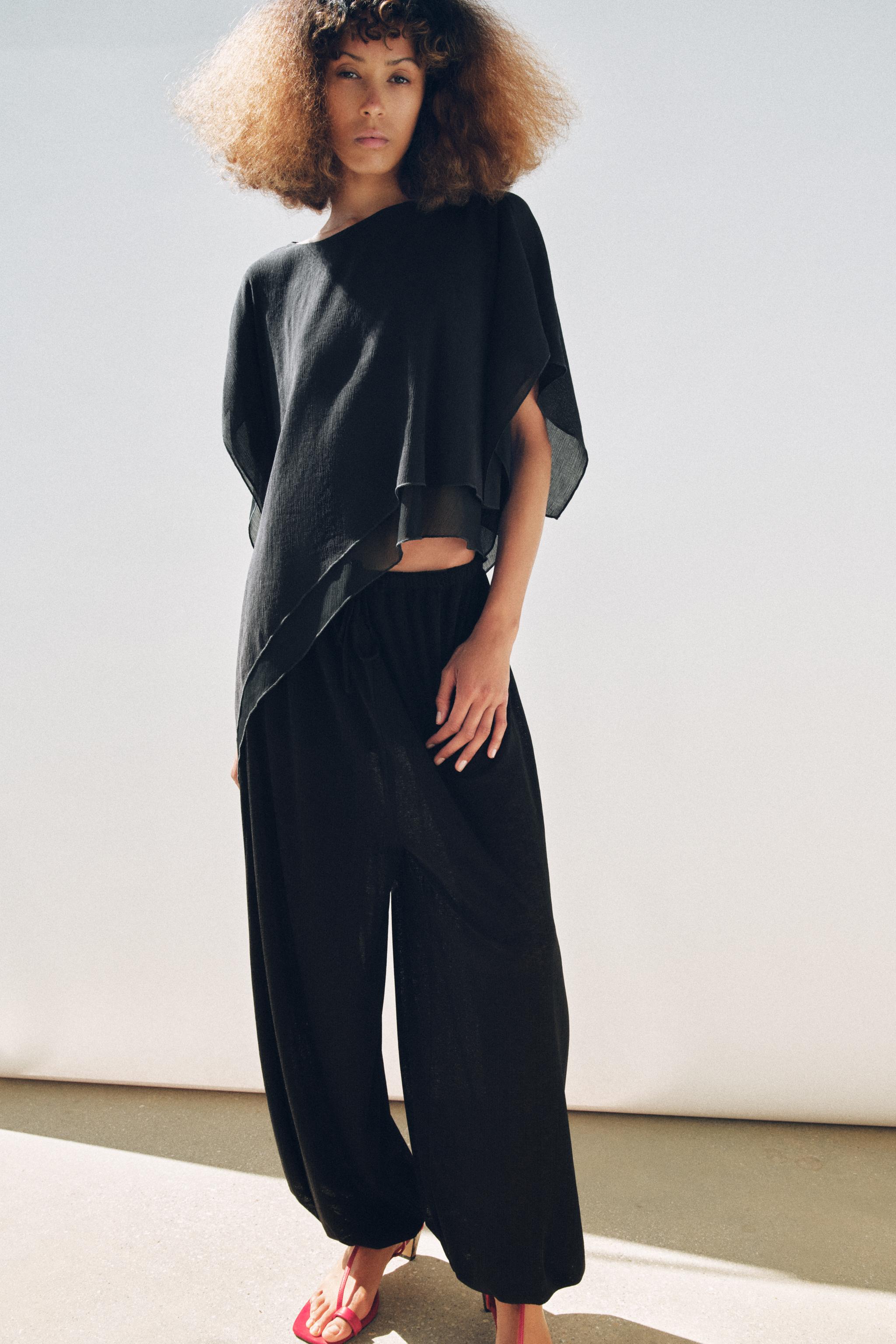 ASYMMETRIC TEXTURED CAPE